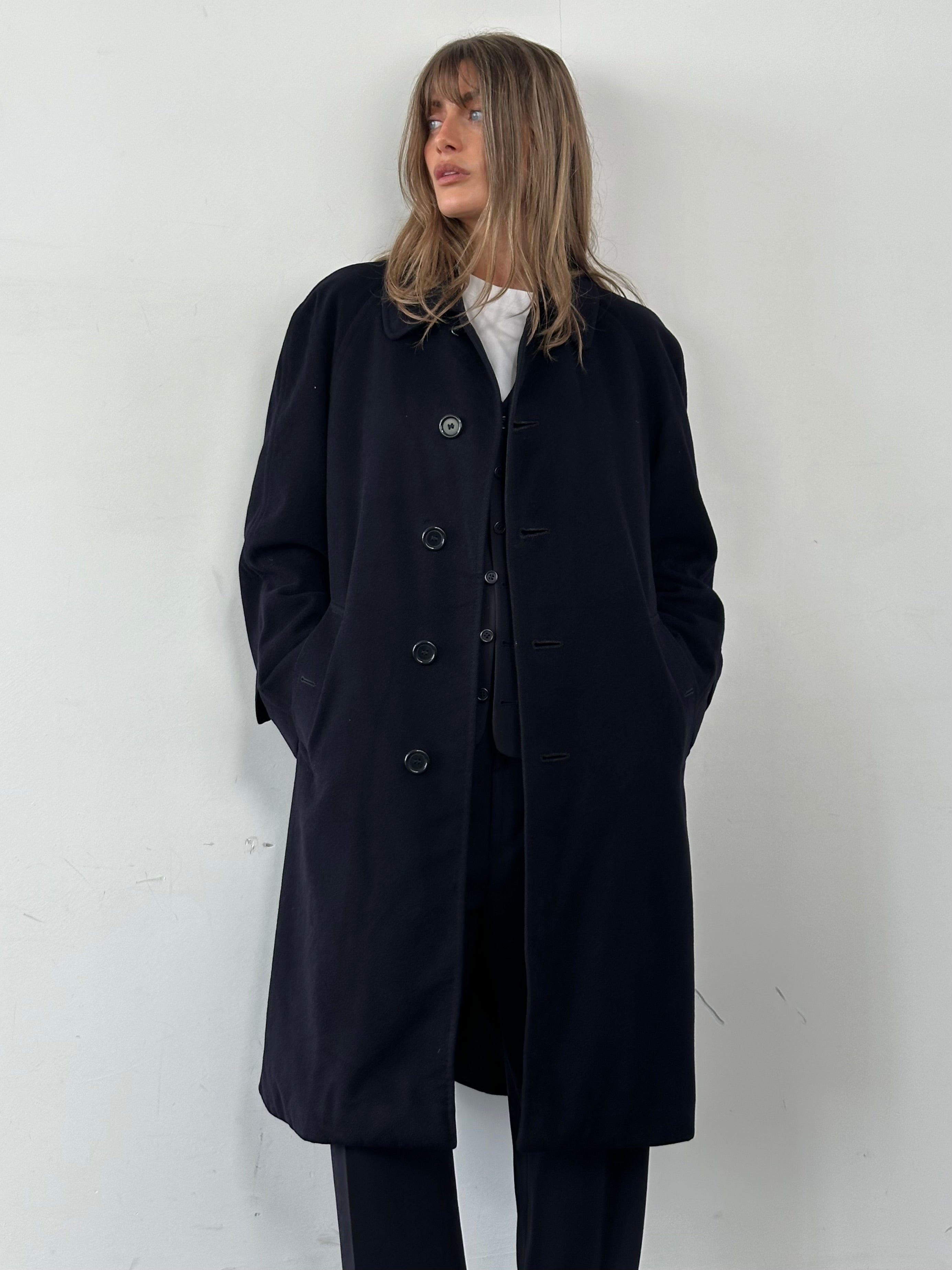 Burberry pure cashmere single-breasted coat in size L, stylish and warm, shown on a hanger.