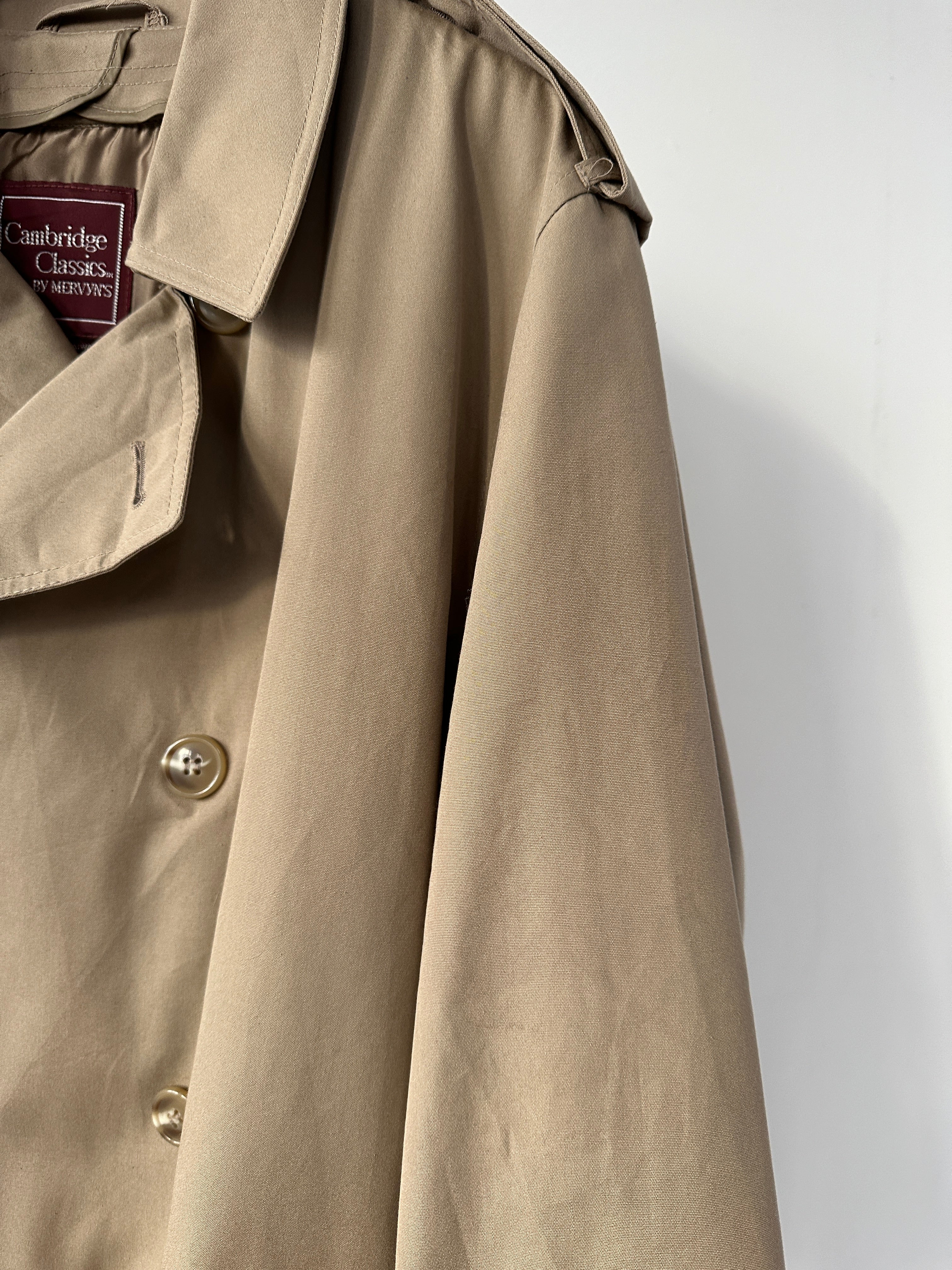 Vintage double-breasted fleece-lined trench coat in size XL, featuring classic design and warm, cozy fabric for cold weather.