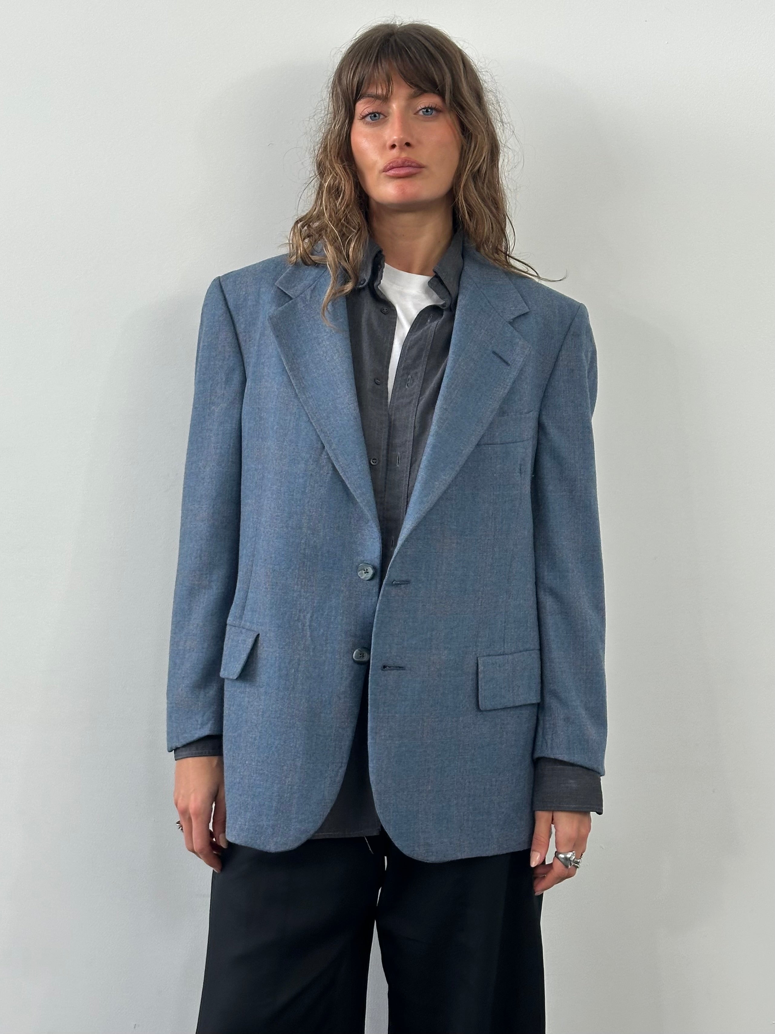 Christian Dior Paris 1980s pure wool check blazer in size 40R/L, tailored fit with classic plaid pattern and structured lapels.