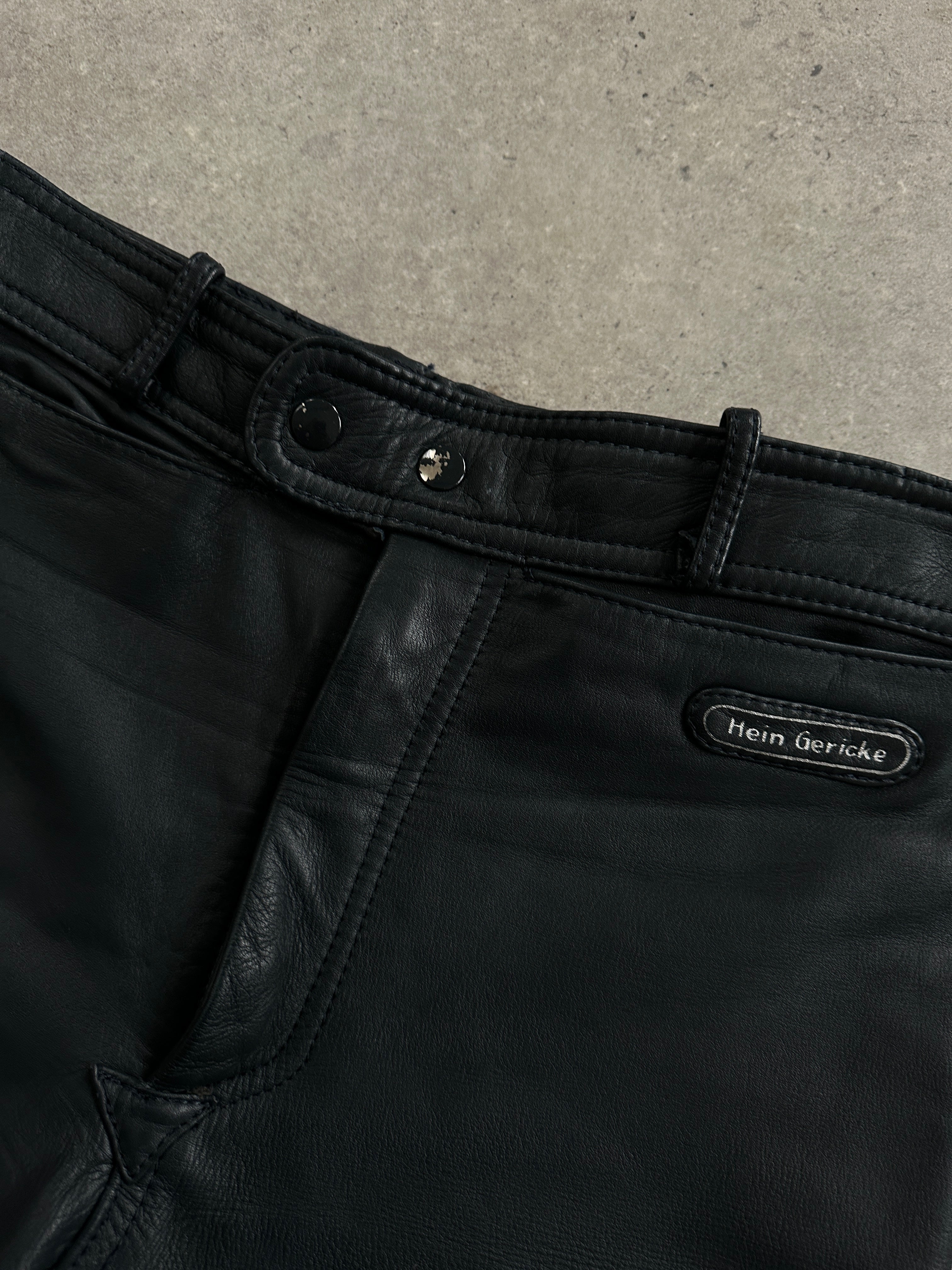 Vintage leather straight leg trousers in W28 style, featuring classic design and rich leather texture.