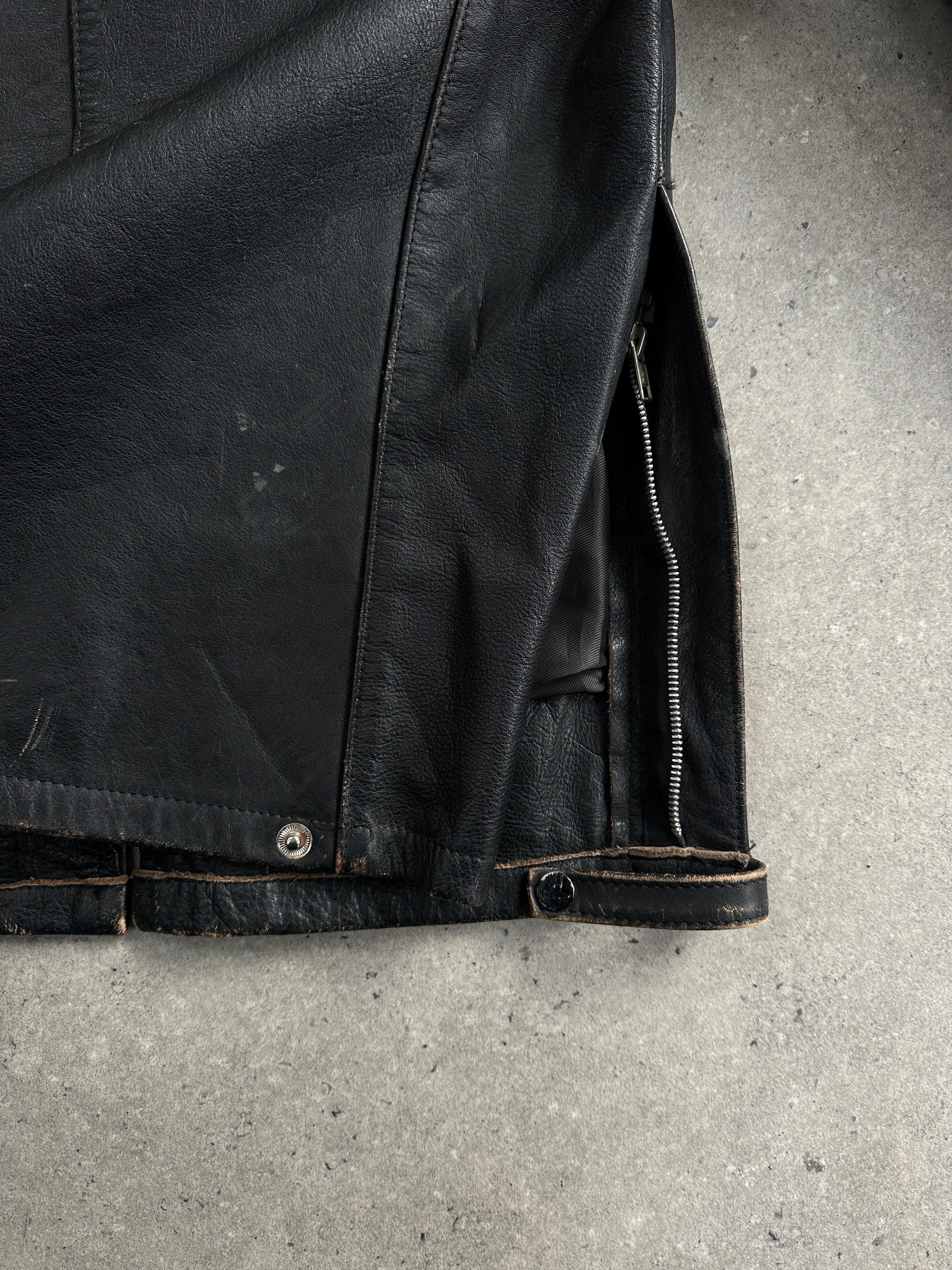 Vintage 1990s aged leather jacket, men's size M/L, featuring worn, distressed leather and classic design details.