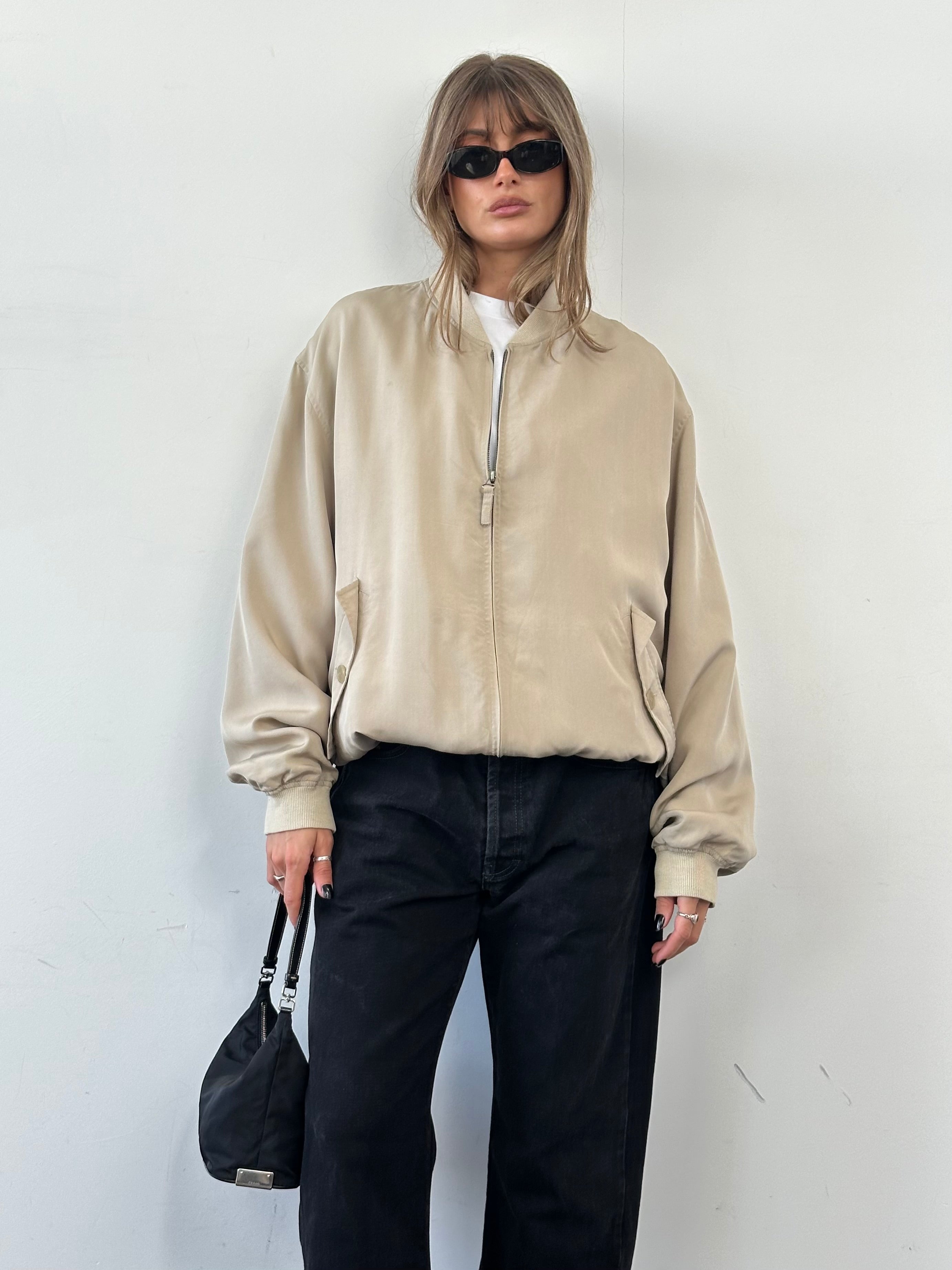 Vintage pure silk bomber jacket in XL, showcasing a classic design with smooth silk fabric and ribbed cuffs and collar.