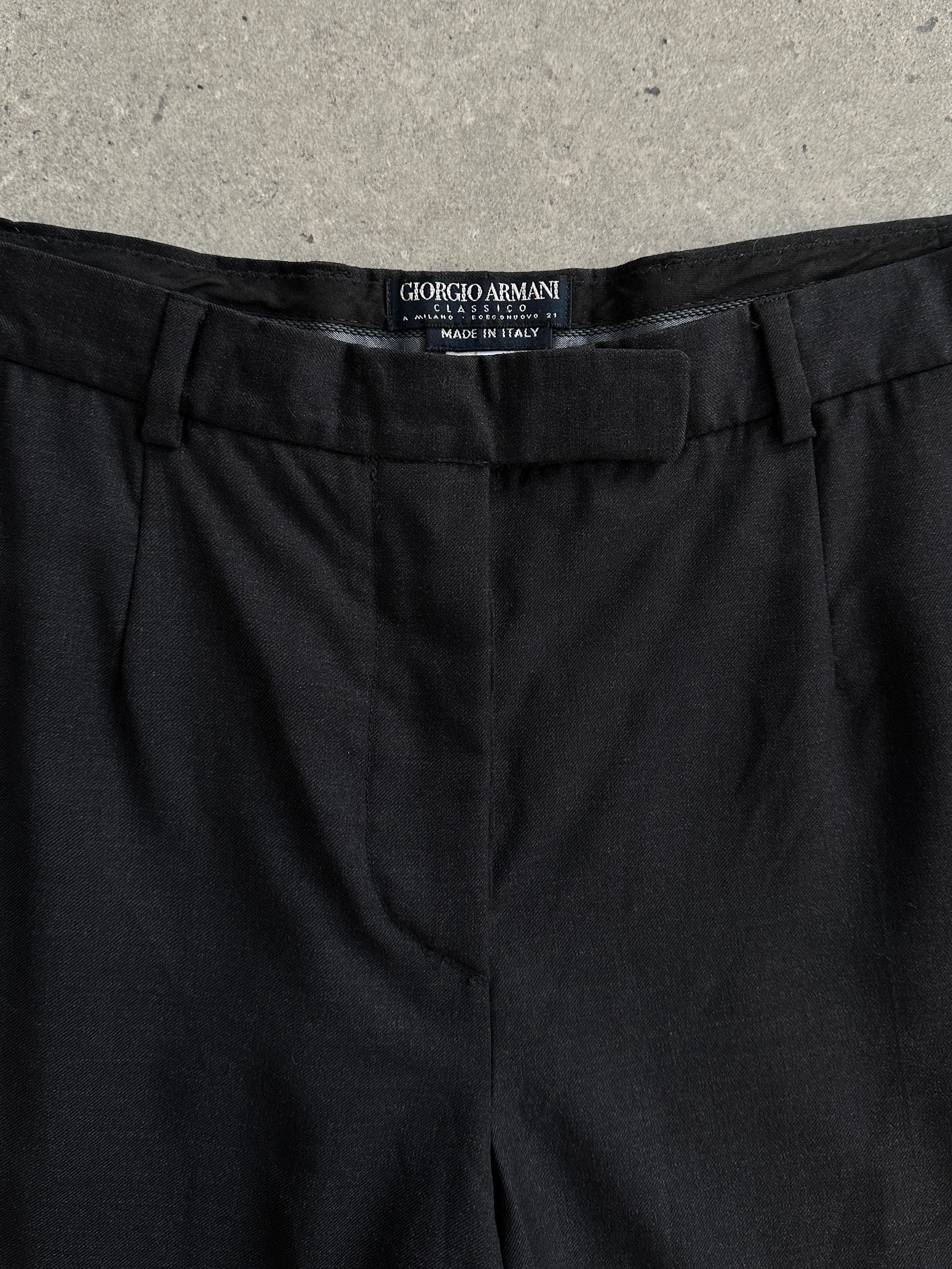 Giorgio Armani Classico pure wool trousers with low-mid rise, worn by a model, showing tailored fit and classic style.