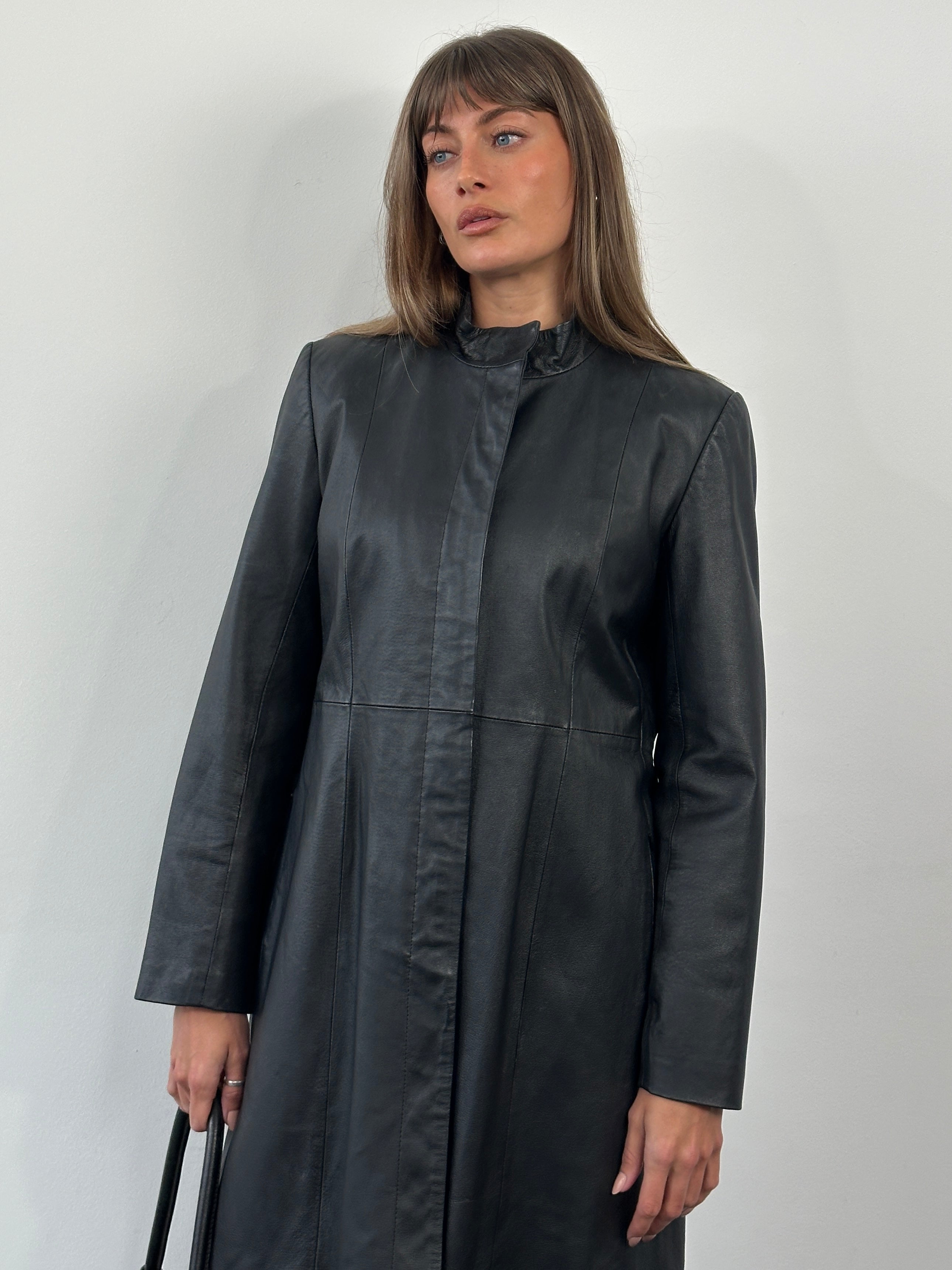 Vintage 1990s high neck leather trench coat, medium size, featuring classic design and rich brown leather material.