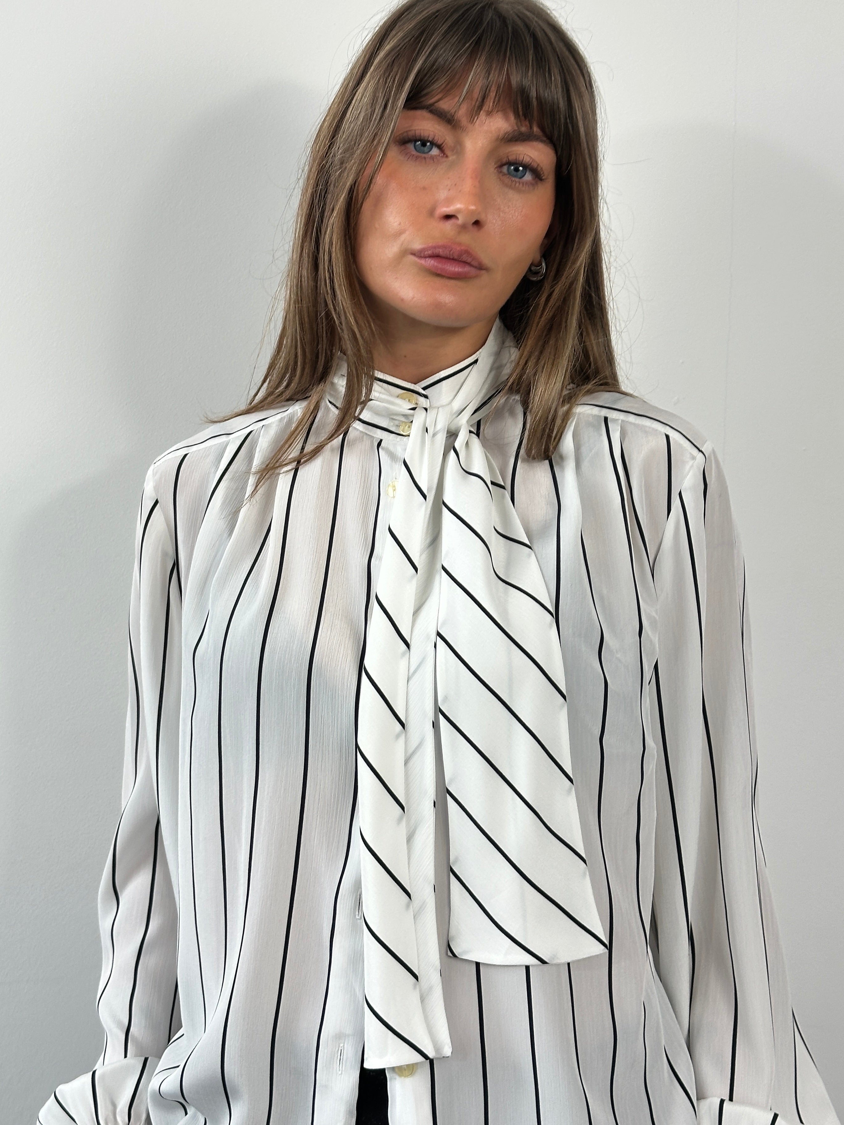 Vintage 1980s sheer stripe tie neck shirt in size M, featuring a classic retro design with lightweight fabric and stylish collar.