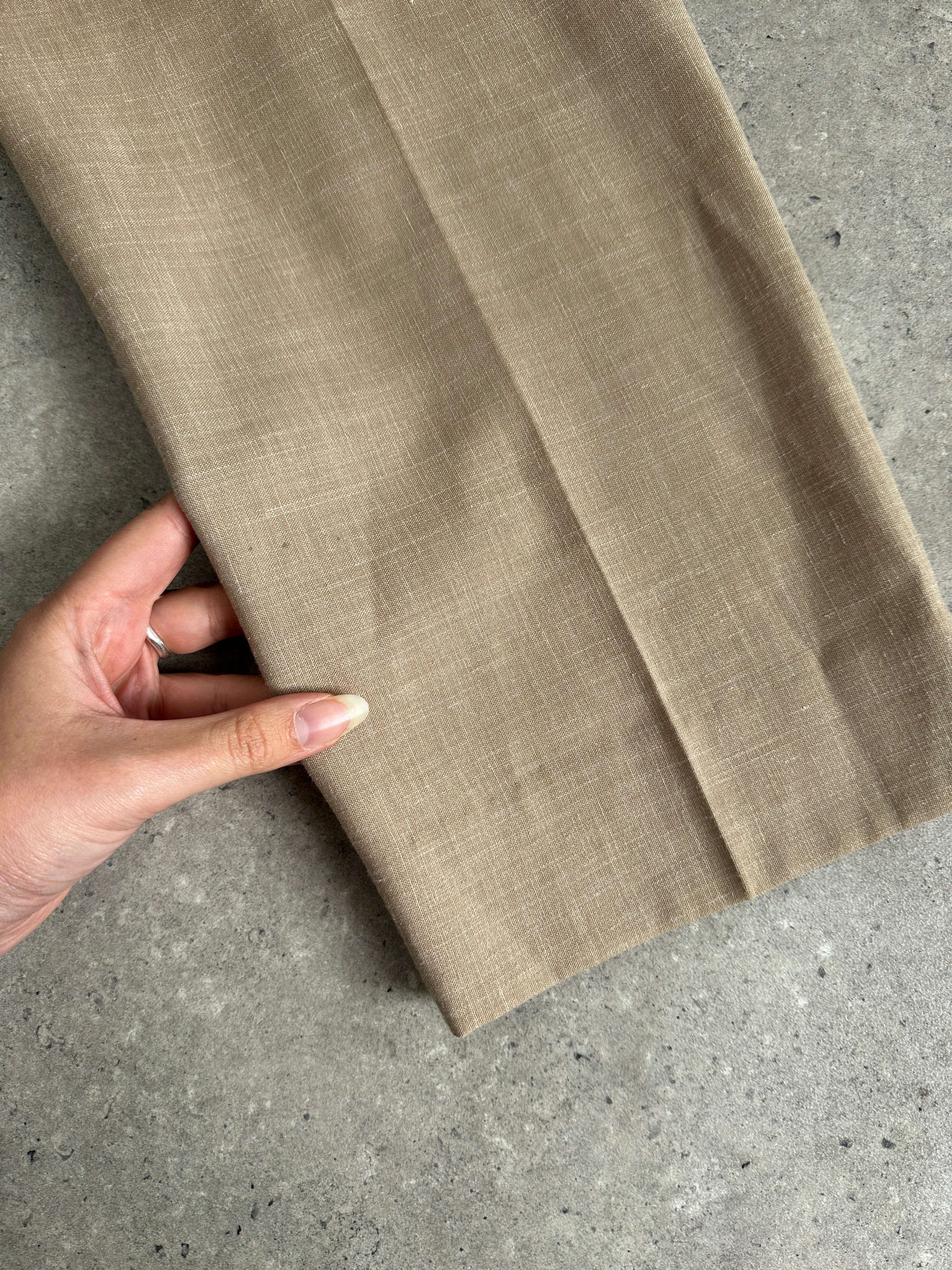 Vintage single-breasted wool linen blend jumpsuit with tailored fit, size 36R/W31, featuring classic lapels and structured design.