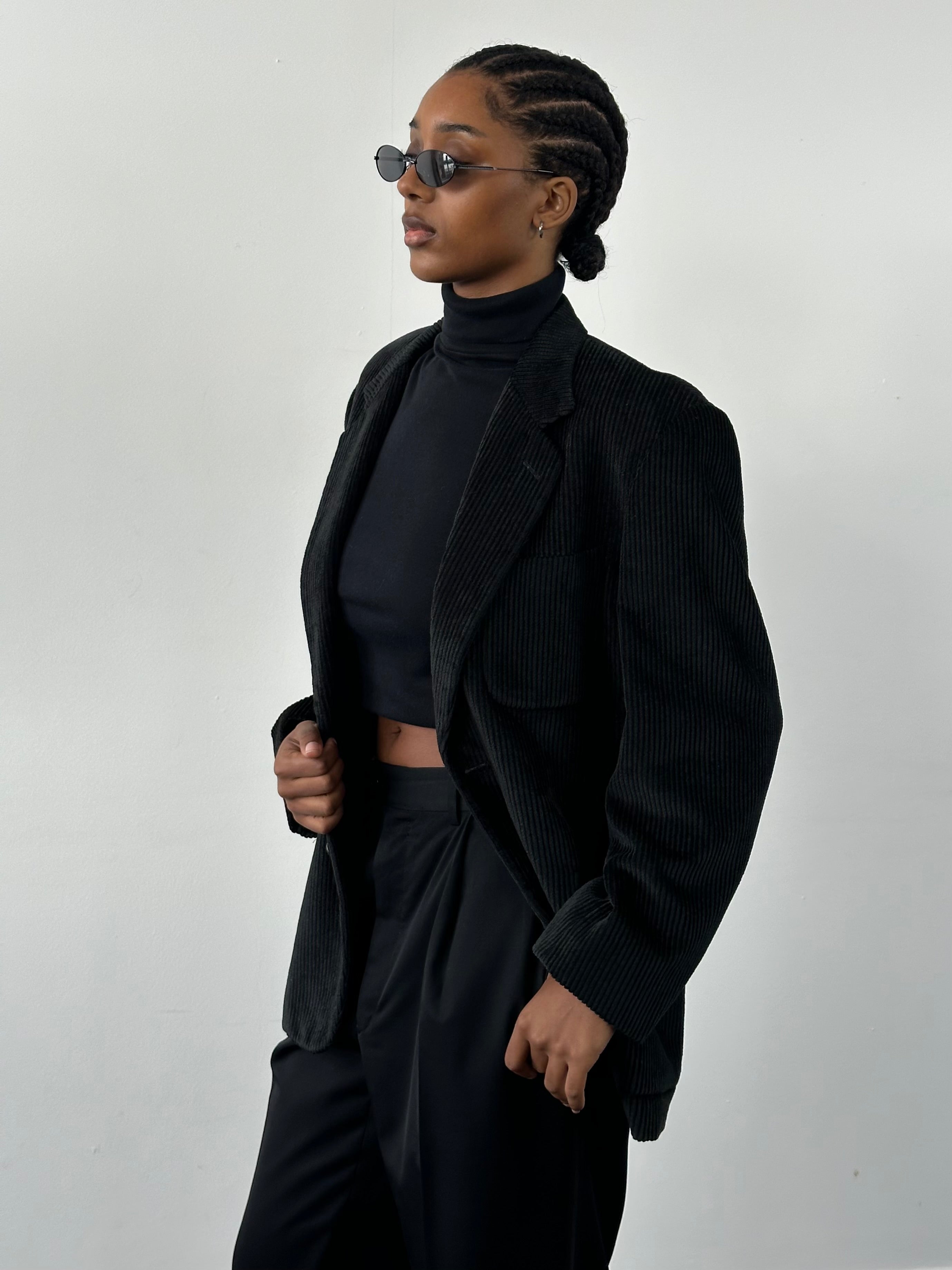 Christian Dior Monsieur 1990s corduroy single-breasted blazer in size 40R/M, shown on a hanger with visible lapels and button details.