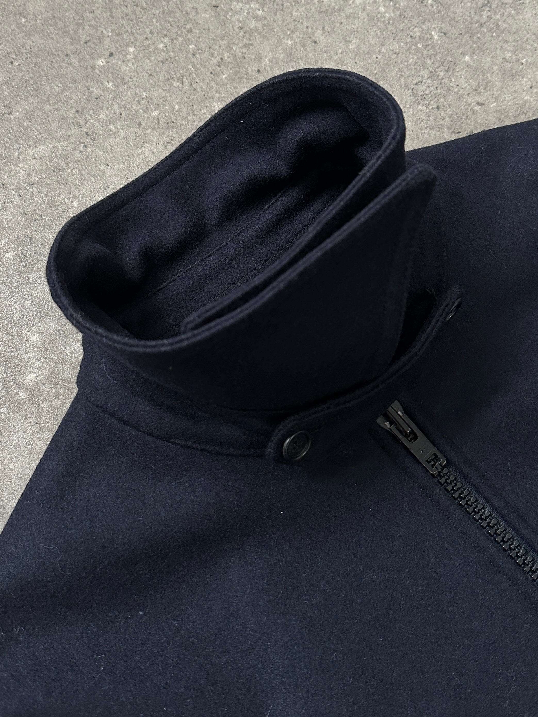 Ermenegildo Zegna 1990s wool double-faced jacket in size large, showing the tailored lapel and textured fabric detail.