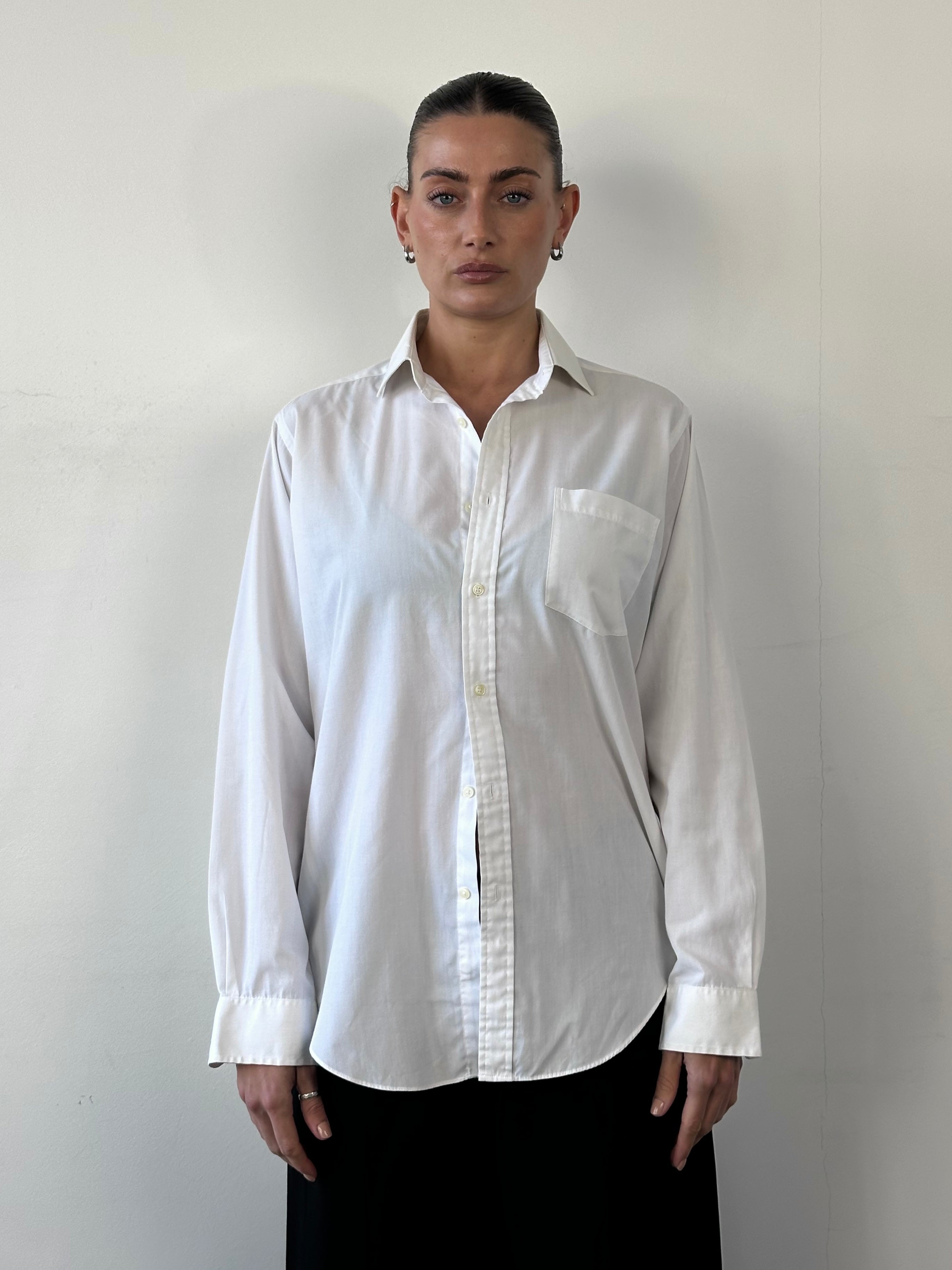 Christian Dior Monsieur cotton logo shirt in size M/L, showing the classic design and Dior branding on the front.