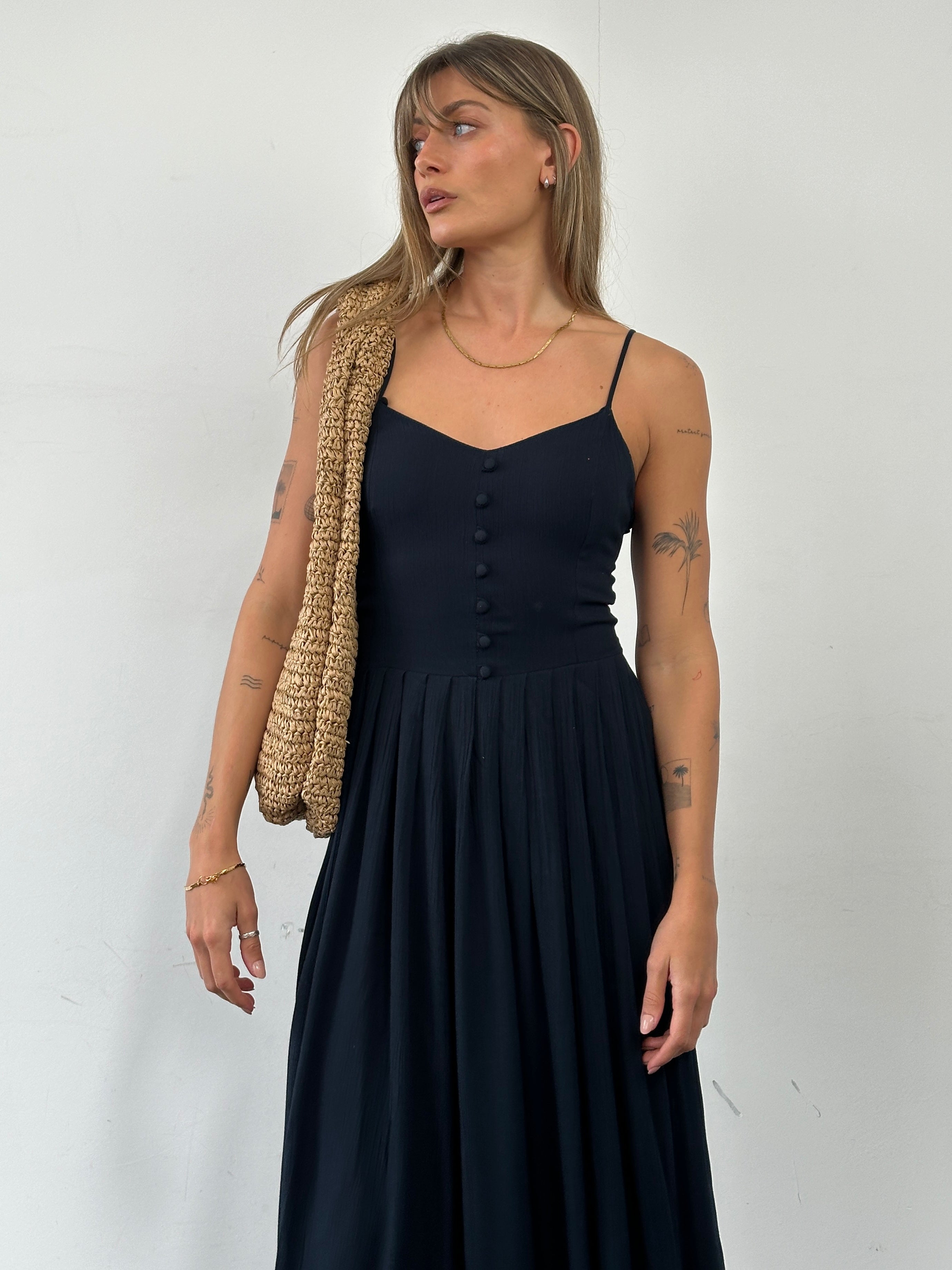 St Michael British pleated crinkle midi dress in size M, featuring a flowing silhouette and textured fabric.