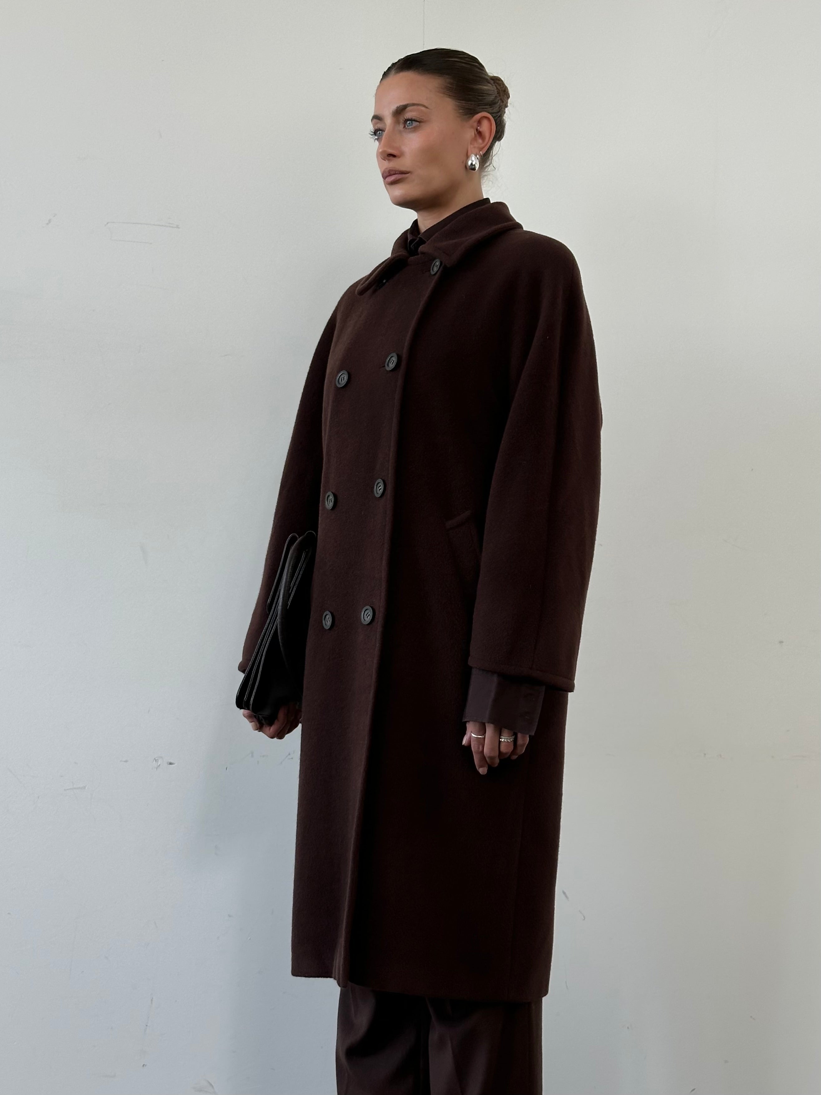 Marella wool cashmere double-breasted coat in size L, shown on a hanger with a classic tailored design and neutral color.