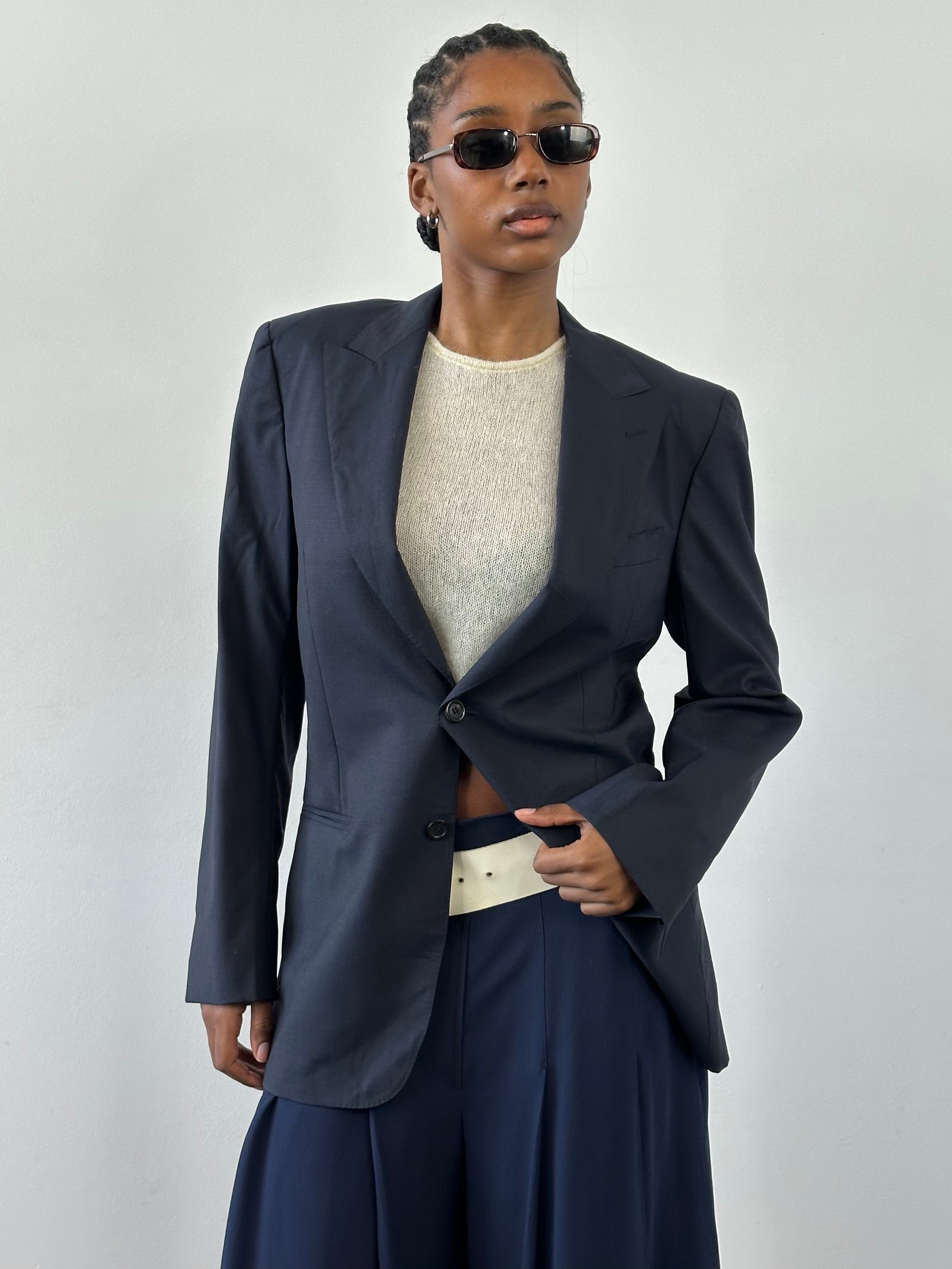 Yves Saint Laurent Rive Gauche 1990s pure wool blazer in size 36R/M, tailored fit, dark navy with classic lapel and button closure.