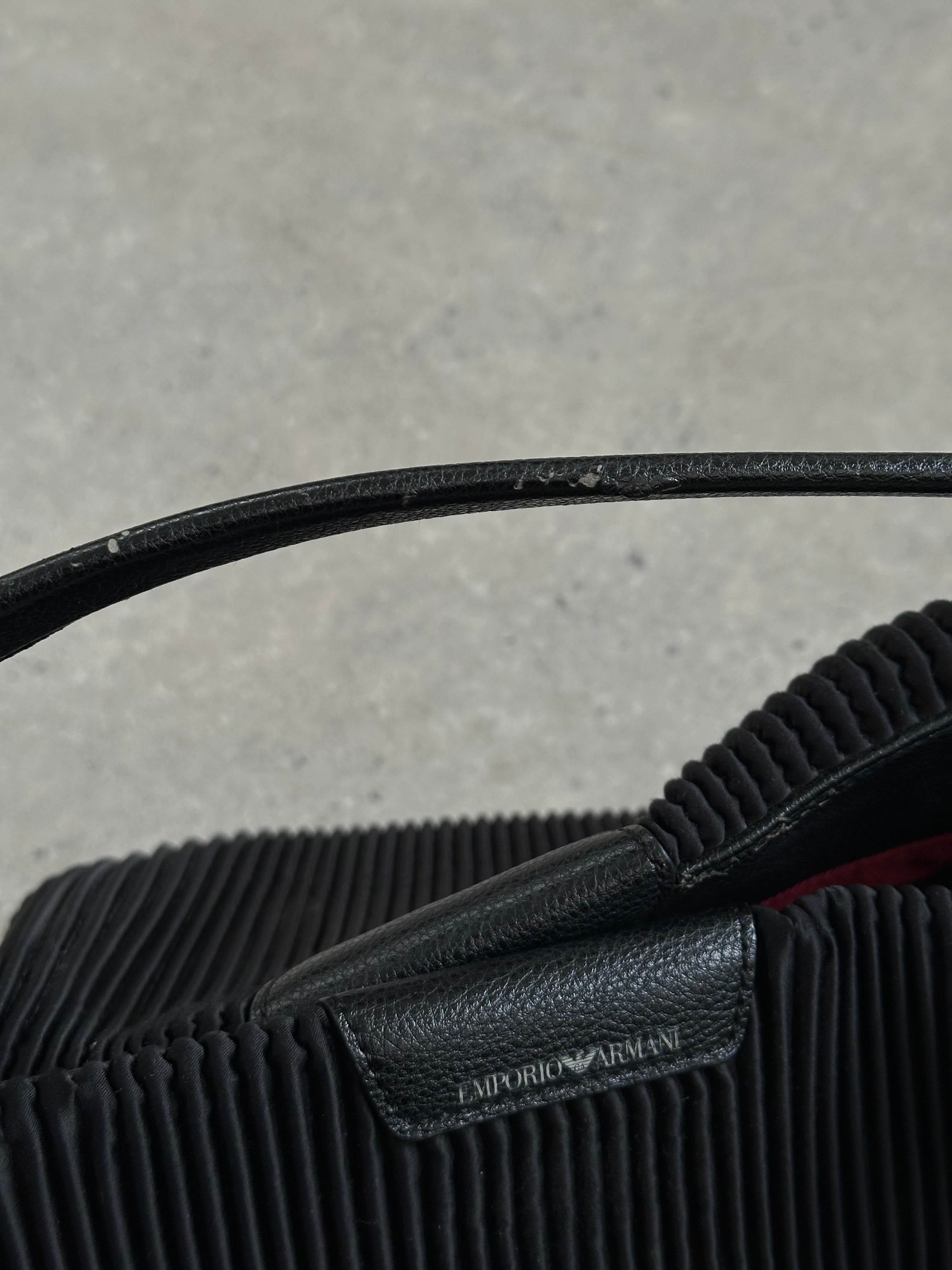Emporio Armani pleated shoulder bag with sleek design and adjustable strap, crafted from high-quality materials.