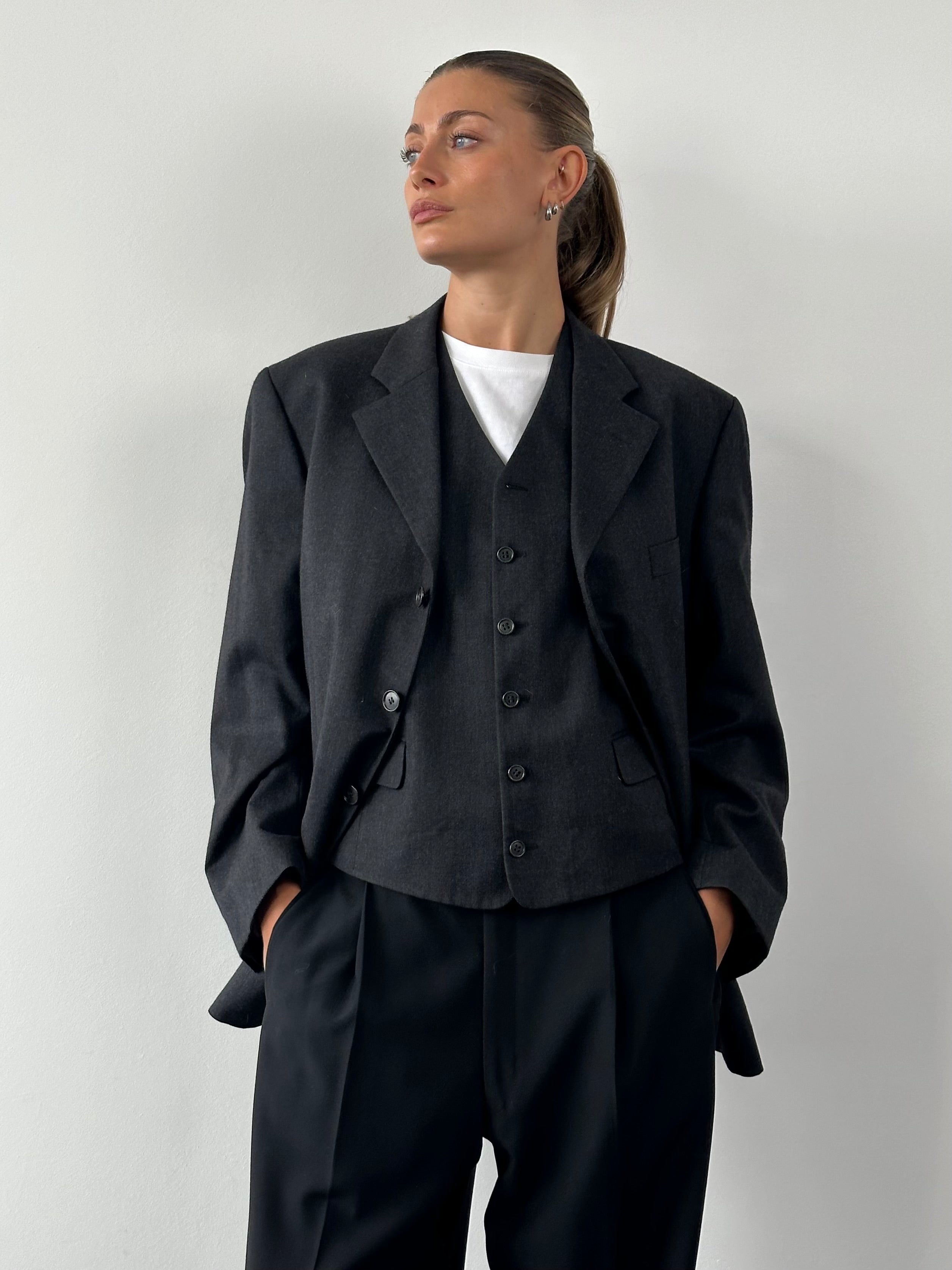 Yves Saint Laurent Pour Homme pure wool blazer two-piece set in size 40S/L, navy blue with notch lapel and tailored fit.