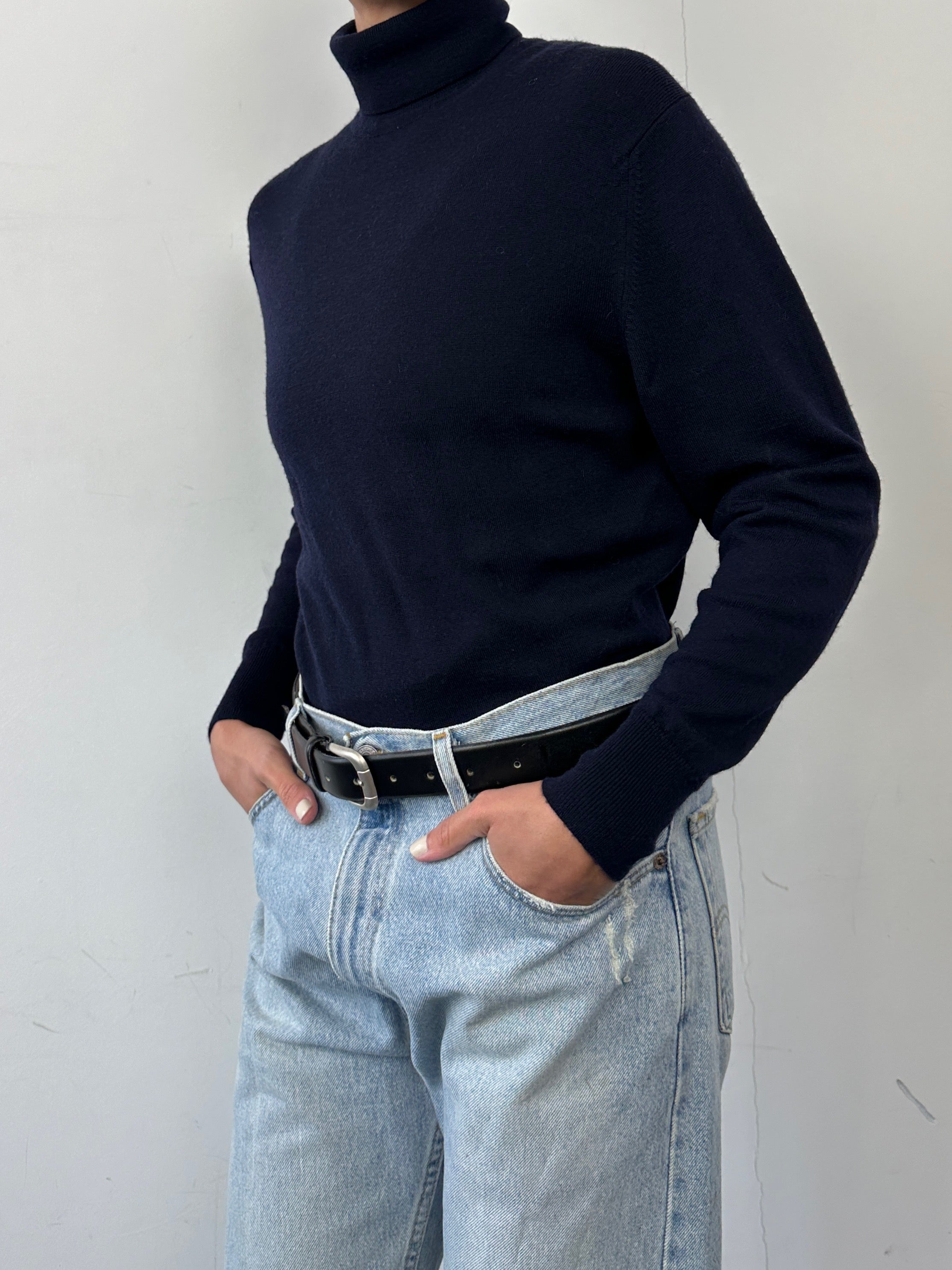 Jaeger pure wool knitted roll neck jumper in size M, beige color, close-up of the soft, textured fabric and rolled collar.