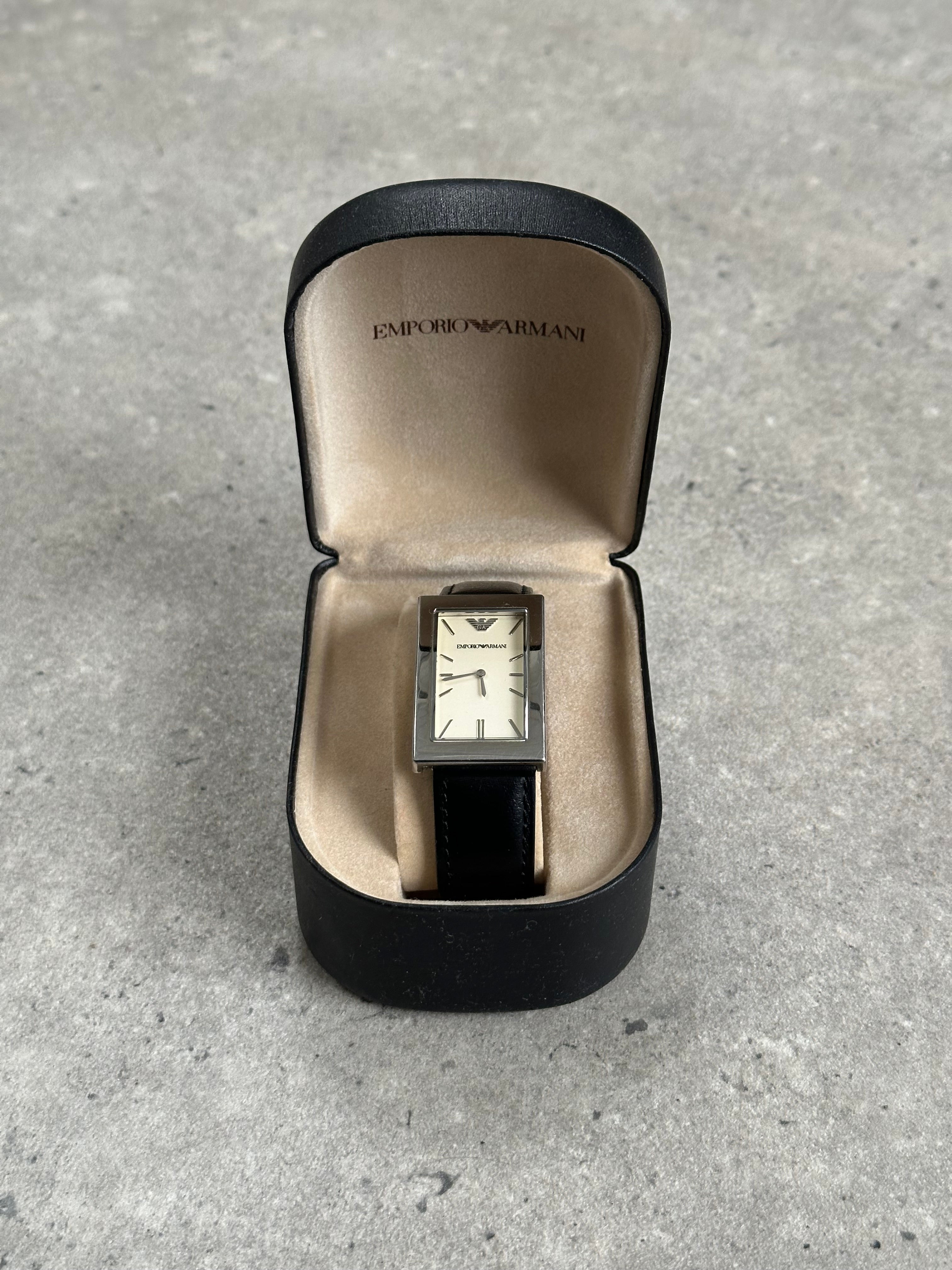 Emporio Armani 2000s rectangular stainless steel watch with leather strap, elegant men's wristwatch with classic design.
