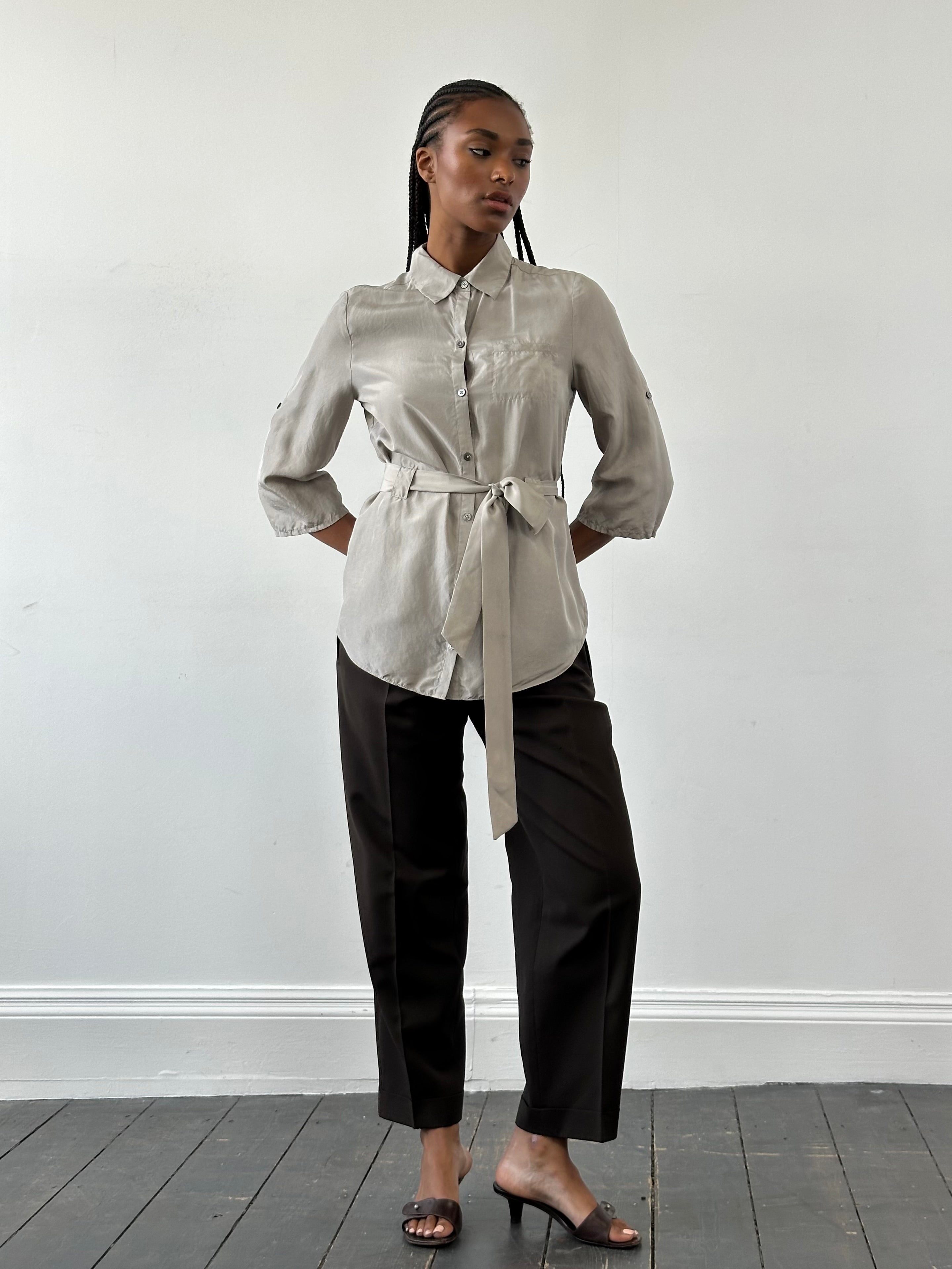 Yves Saint Laurent Pour Homme 1990s tailored wool trousers in size W28, showing the classic fit and detailed craftsmanship.