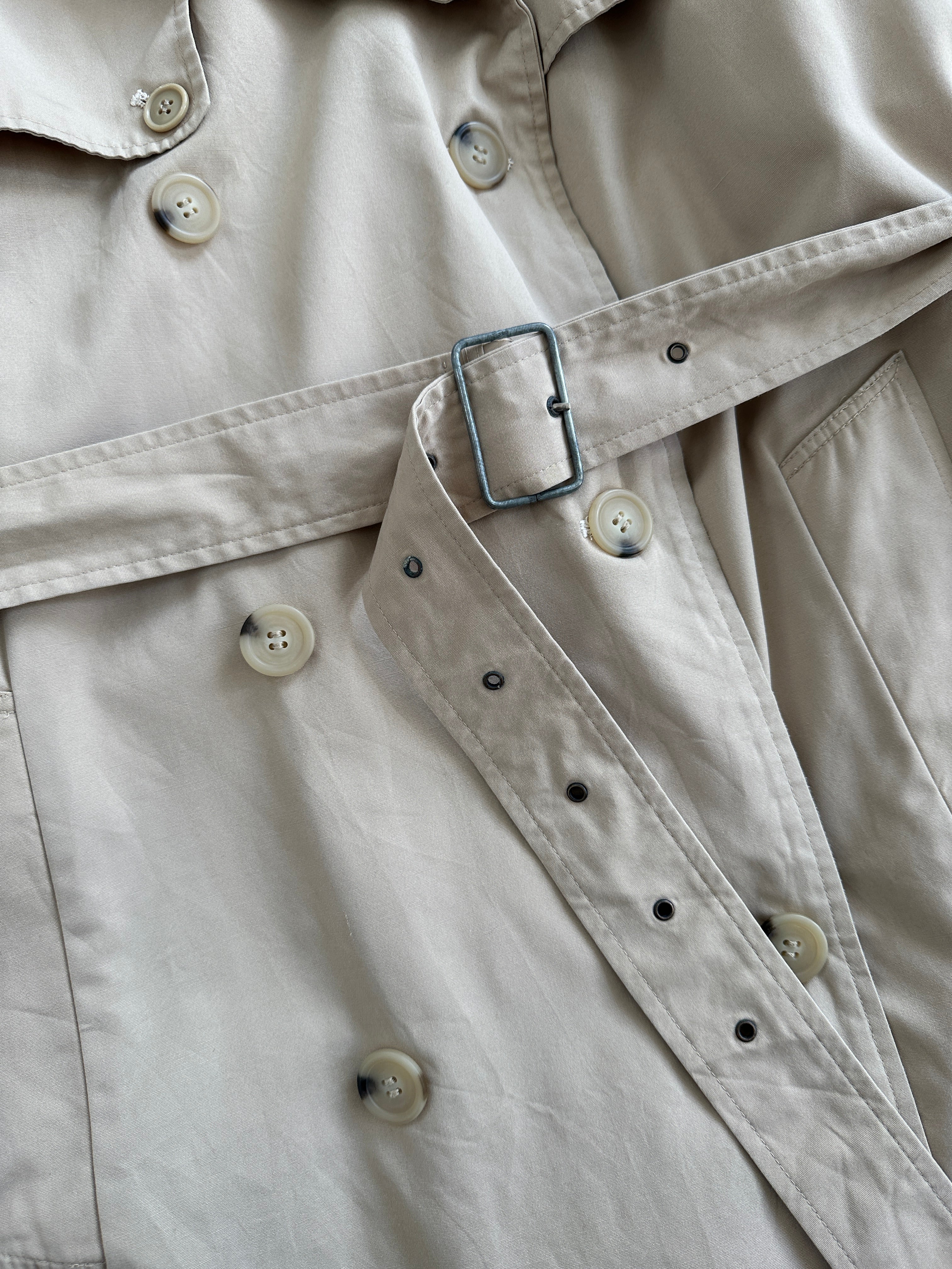 Yves Saint Laurent 70s cotton double-breasted belted trench coat in XL, beige color, shown on a hanger.