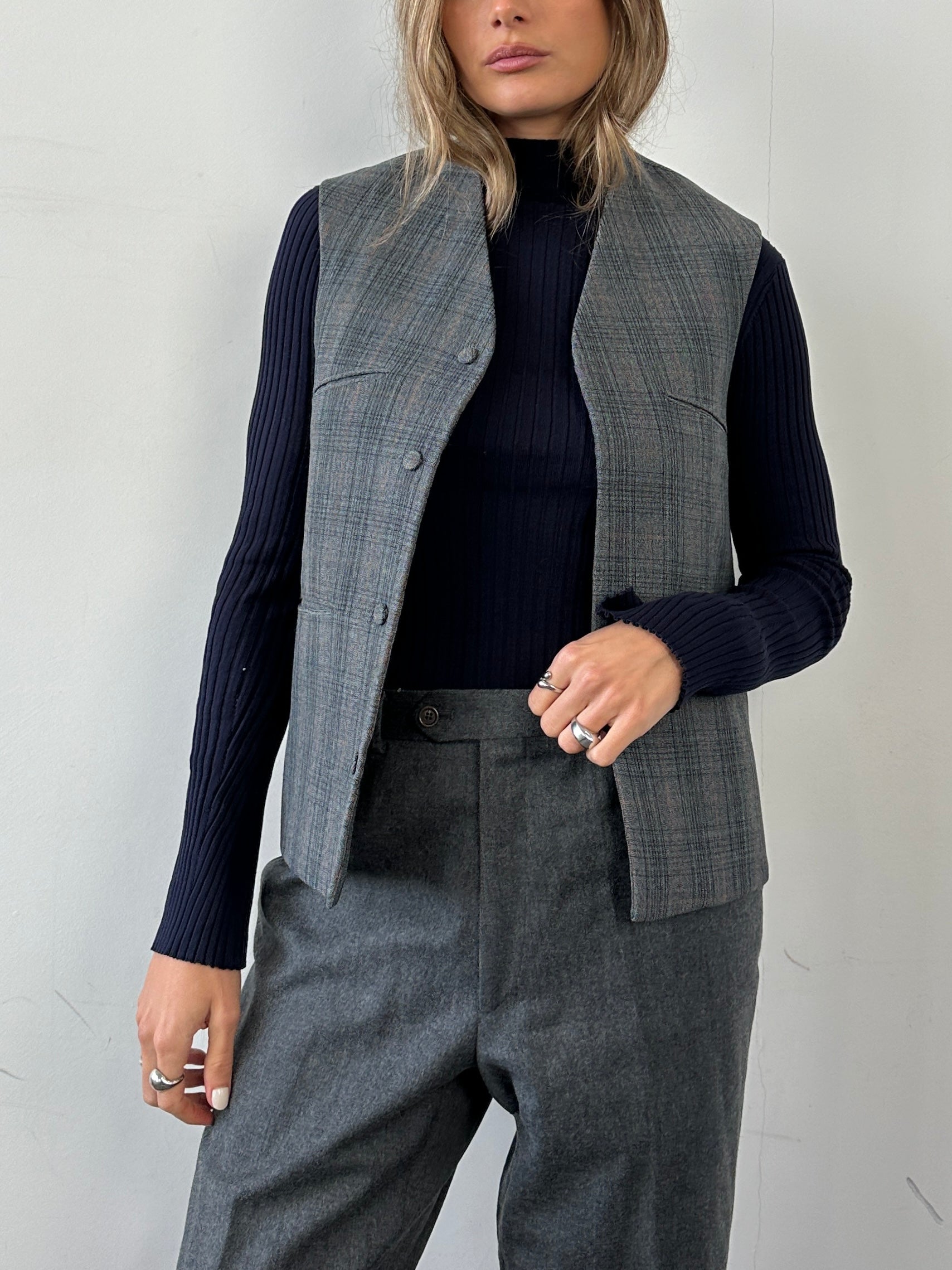Vintage handmade check waistcoat in size M, featuring a classic pattern and tailored fit, ideal for vintage-inspired fashion.
