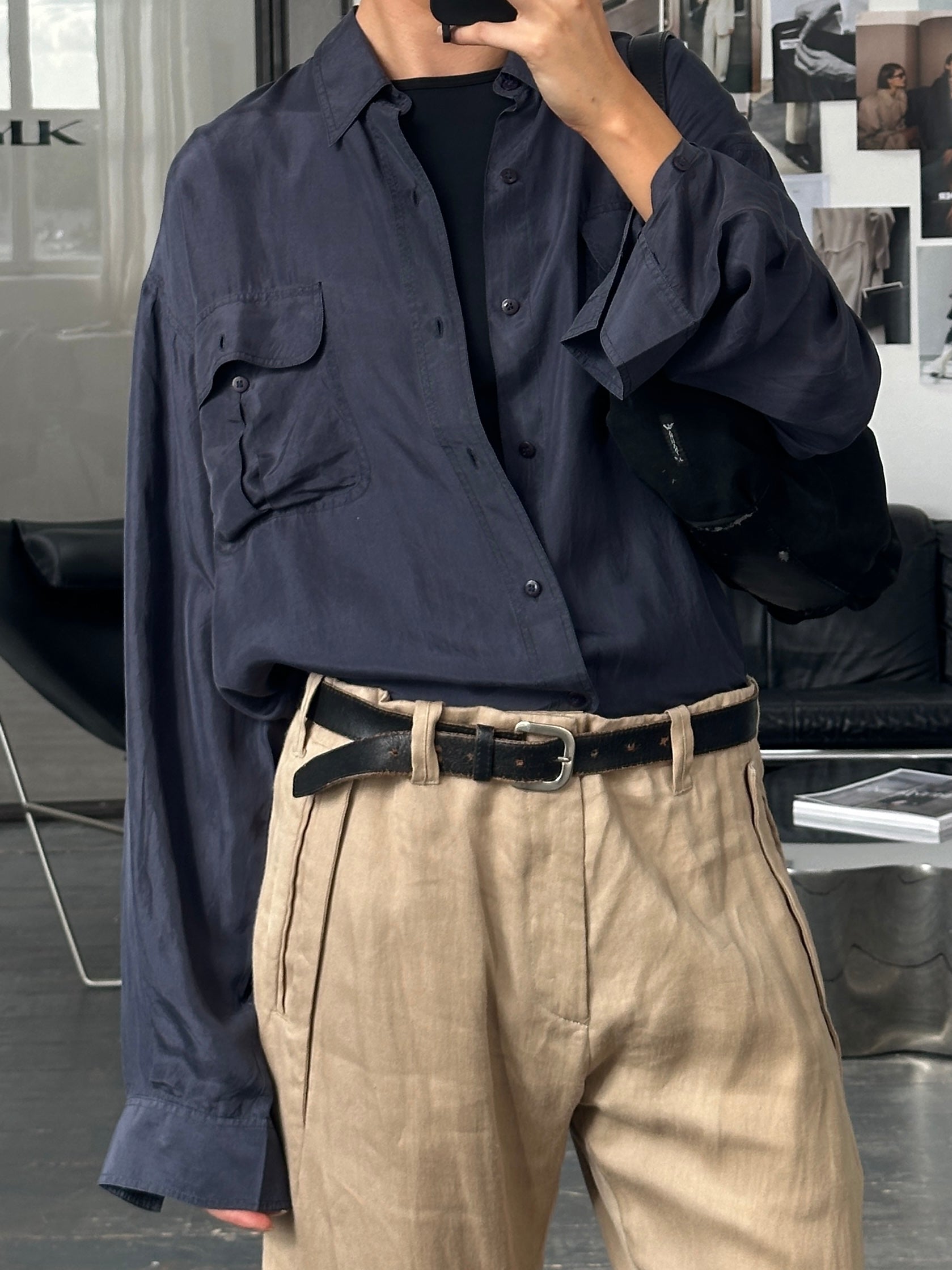 Vintage 1990s relaxed pure silk shirt in XL size, featuring classic design and smooth fabric, displayed on a hanger.