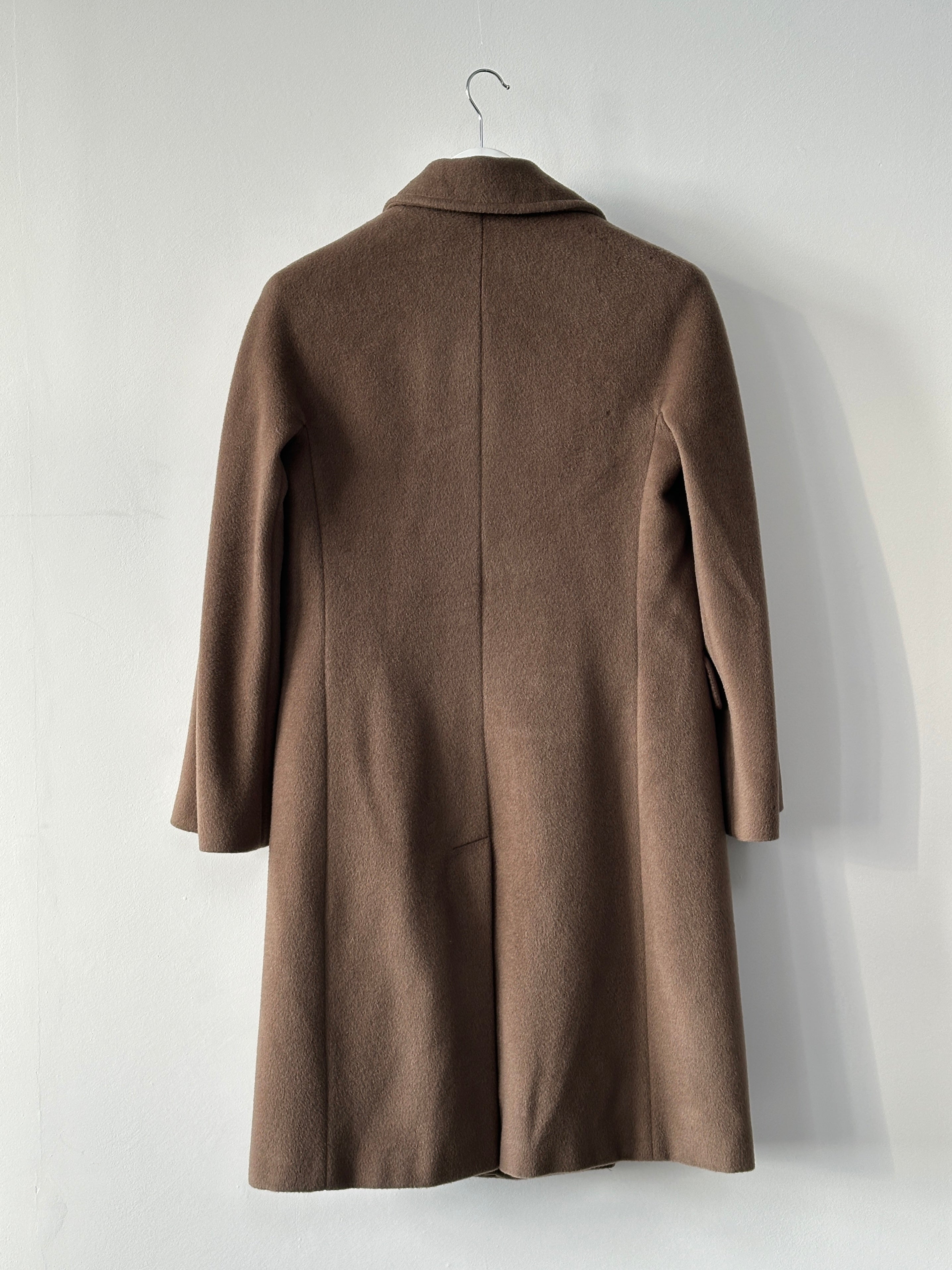 Max Mara pure wool double-breasted coat in size S displayed on a hanger with classic lapel and button details.