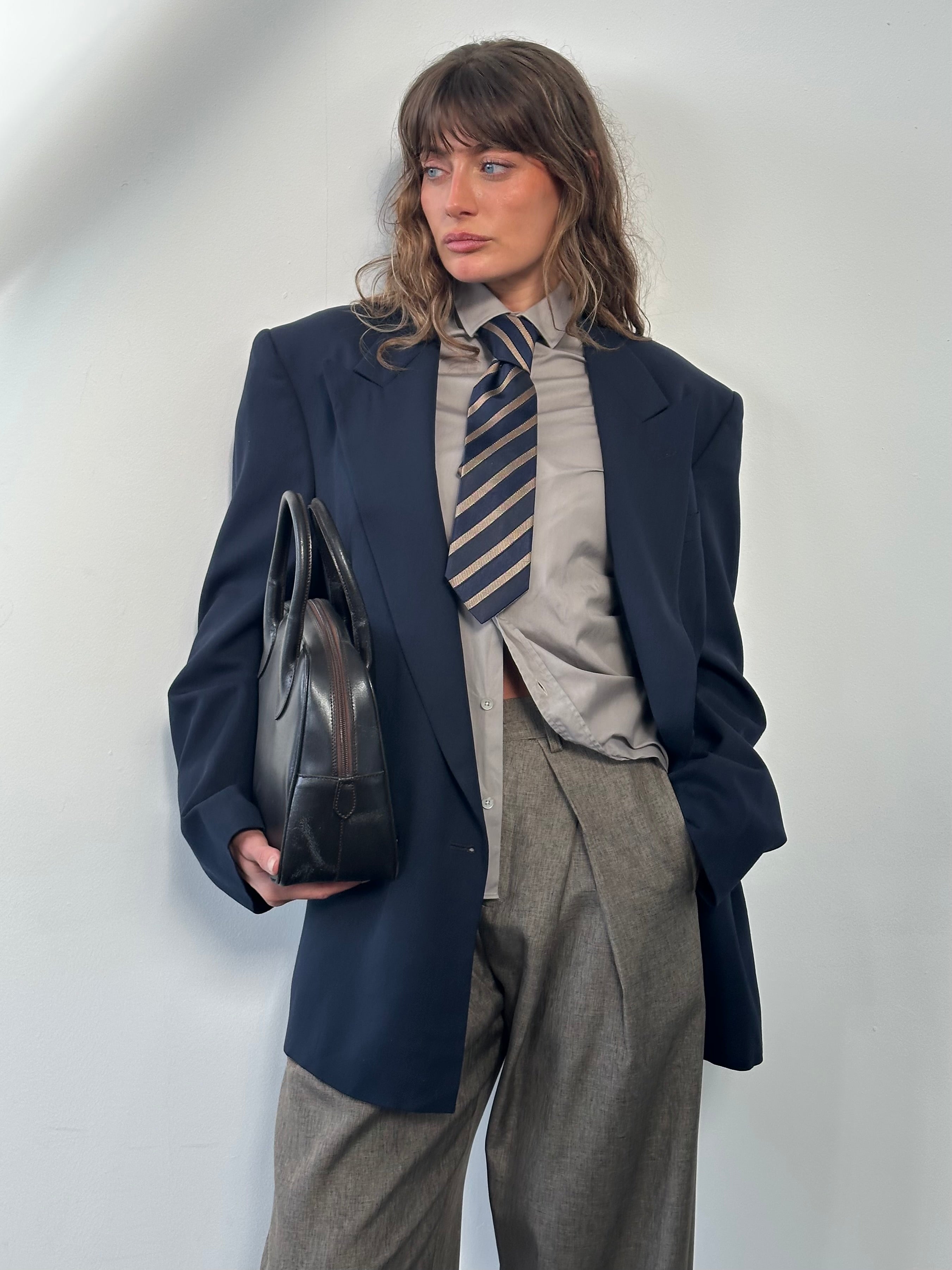 Christian Dior Monsieur 1980s bespoke double-breasted blazer in navy, size 42L/XL, with peak lapels and tailored fit.