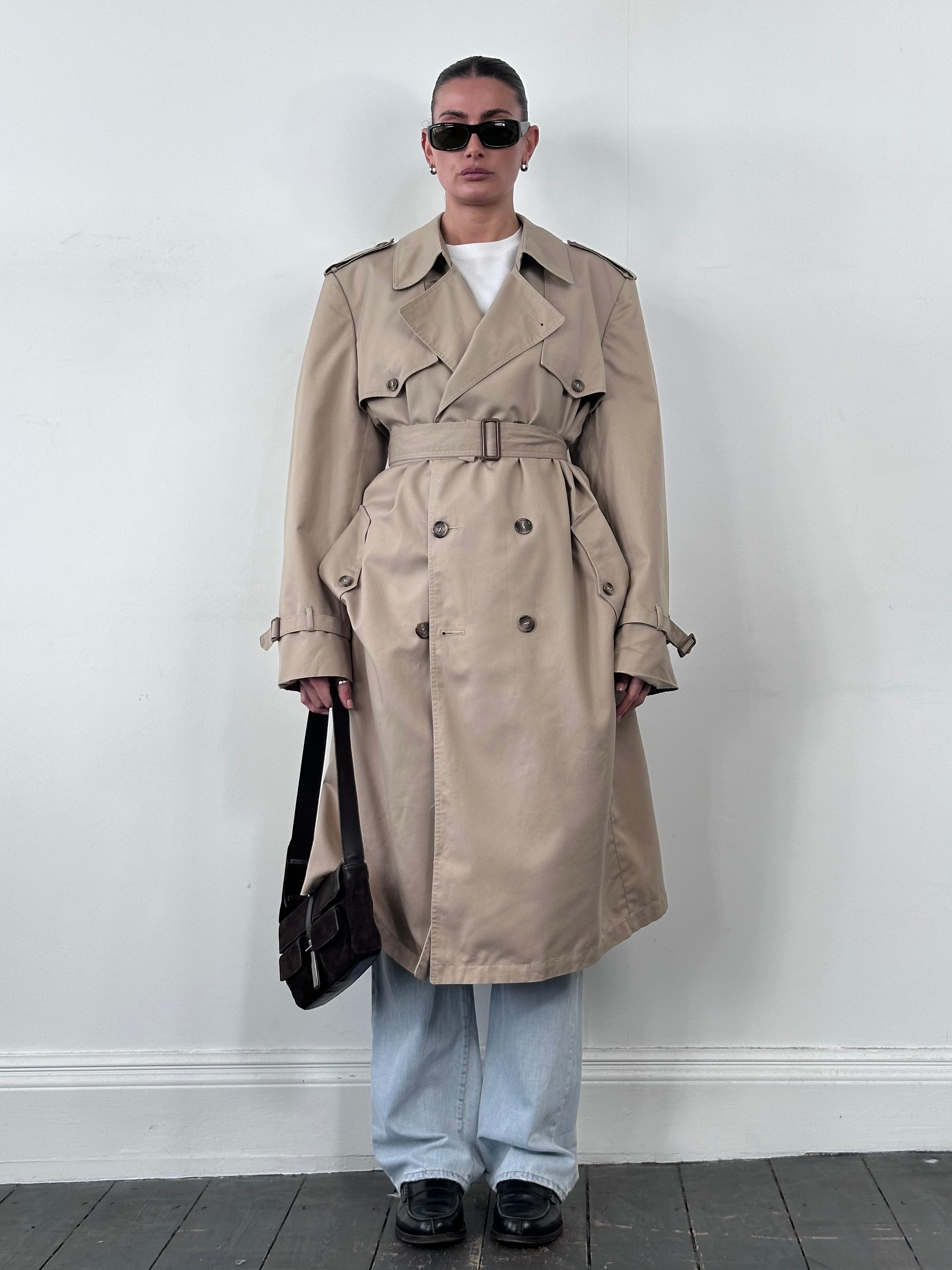 Christian Dior Monsieur cotton double-breasted belted trench coat in size XL, shown with classic design and neutral color.