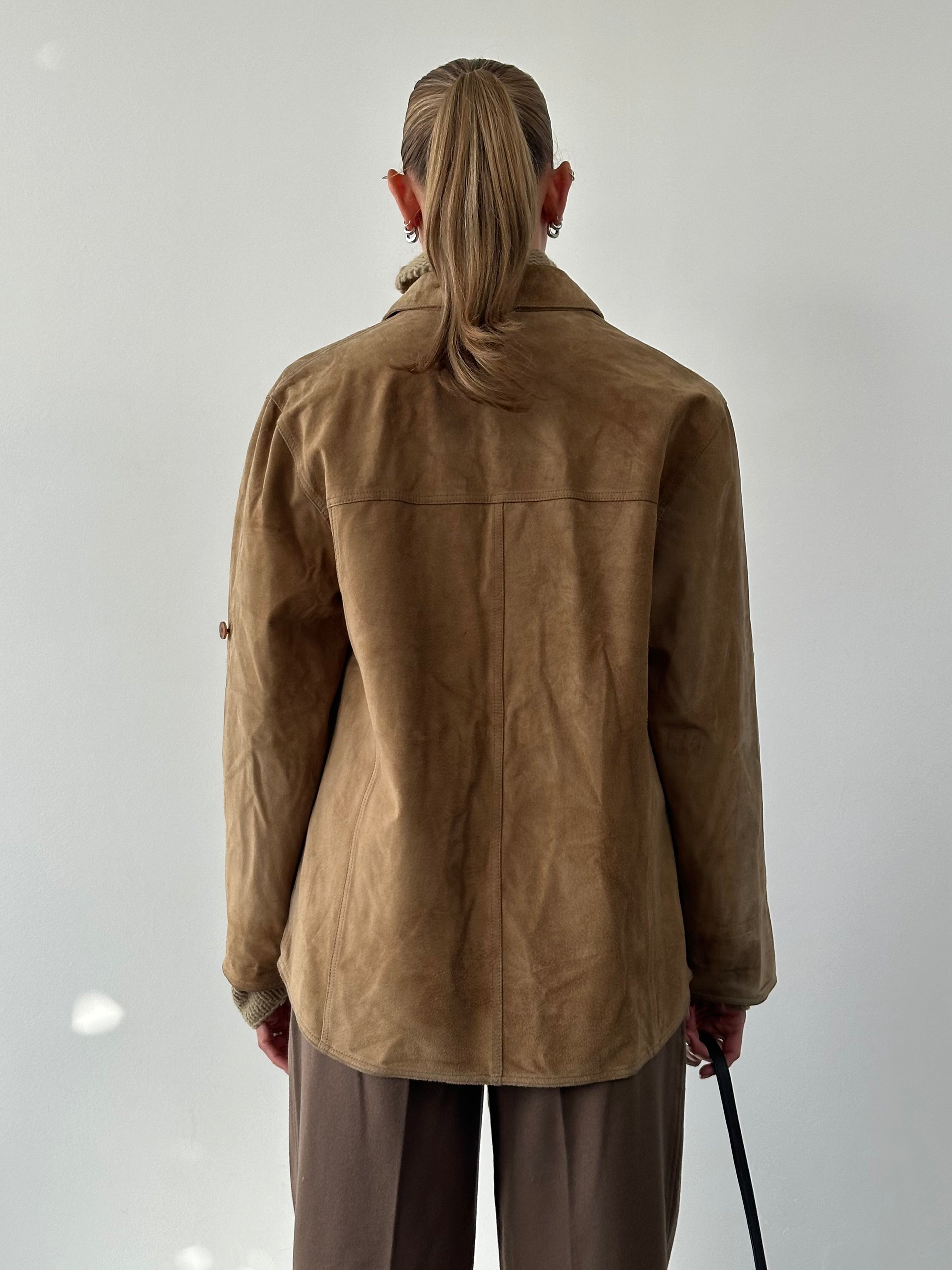 Vintage suede shirt in size large, featuring a classic design with soft texture and stylish details.