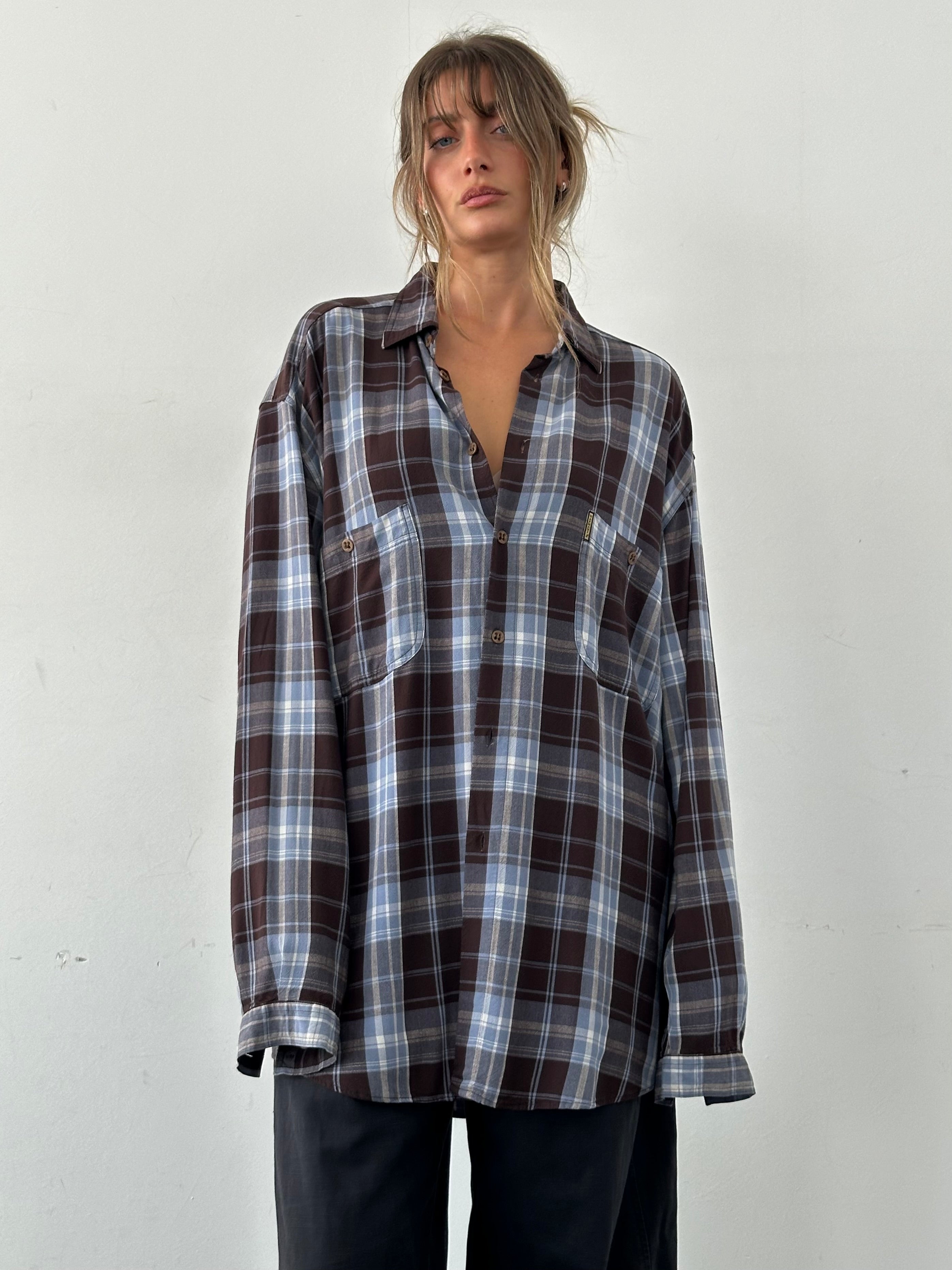 Armani Jeans 90s check flannel shirt in XXL, featuring a classic red and black plaid pattern, button-up front and long sleeves.