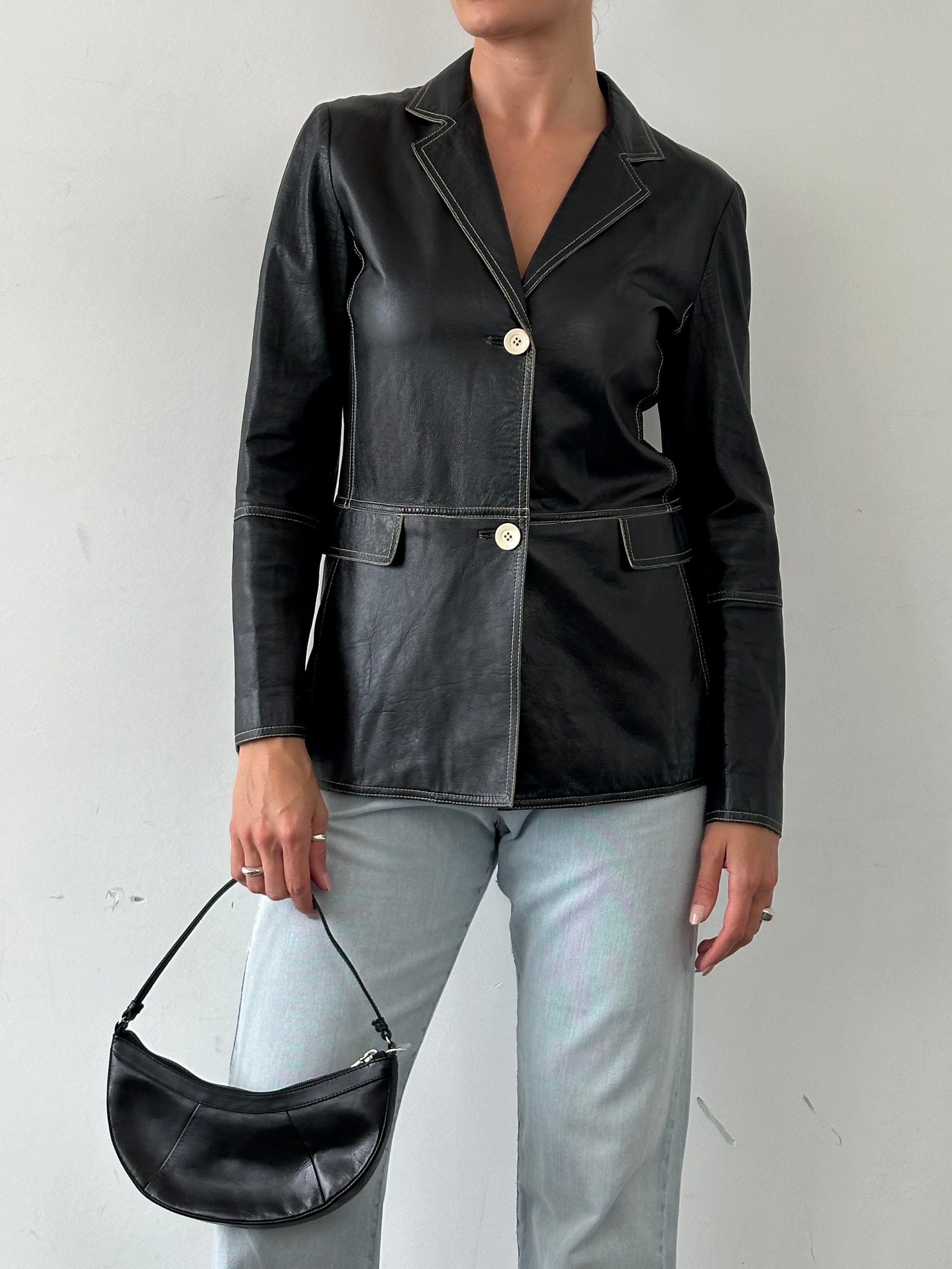 Marella contrast stitch leather jacket in size S, featuring tailored design and stylish detailing, displayed on a hanger.