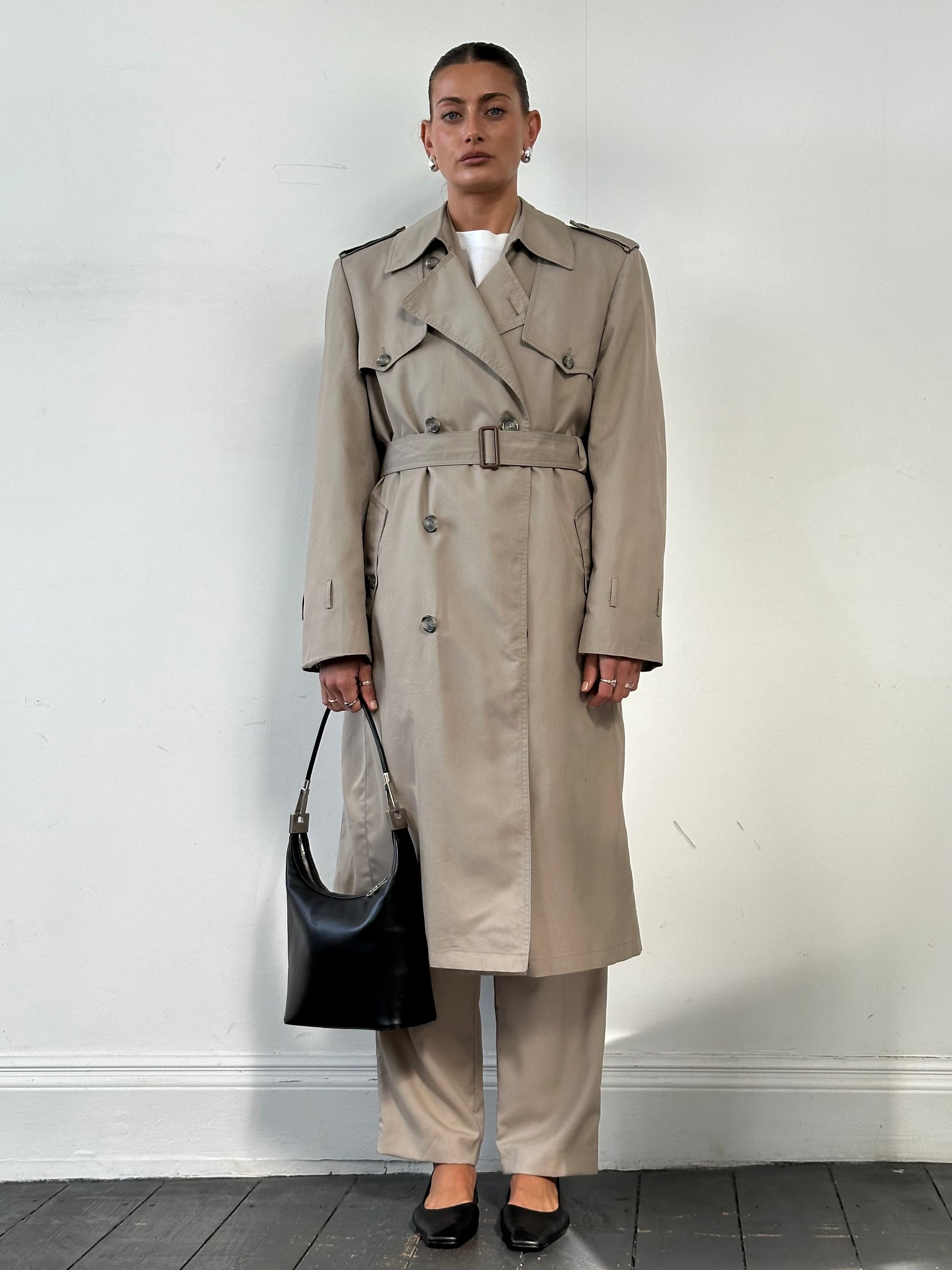Christian Dior Monsieur cotton double-breasted belted trench coat in XL, shown hanging with classic design and neutral color.