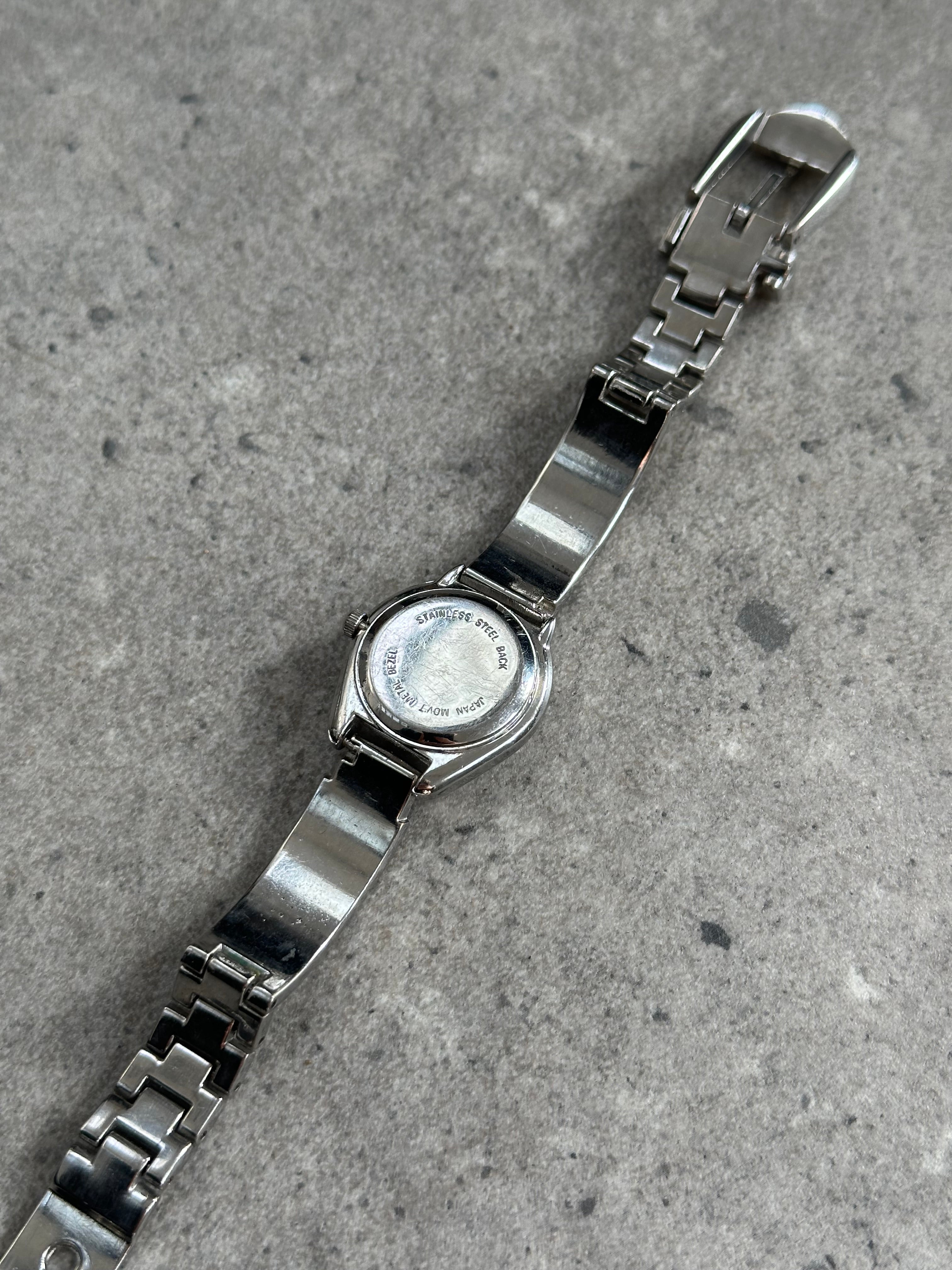 Gucci 1990s stainless steel quartz watch with silver dial and sleek design, showcasing classic luxury style.