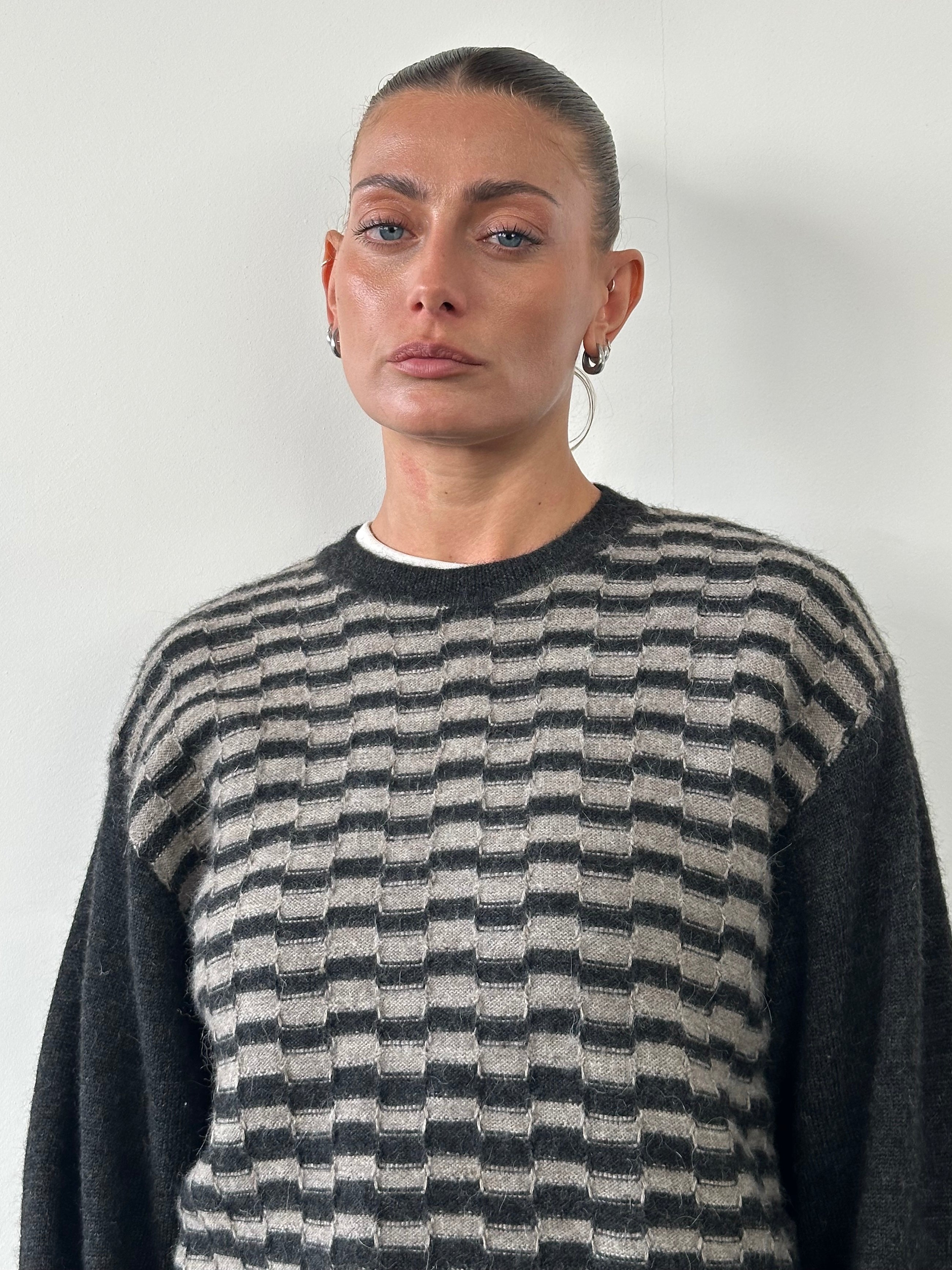 Yves Saint Laurent wool and alpaca knitted jumper in size M/L, featuring a cozy, textured knit pattern and classic design.