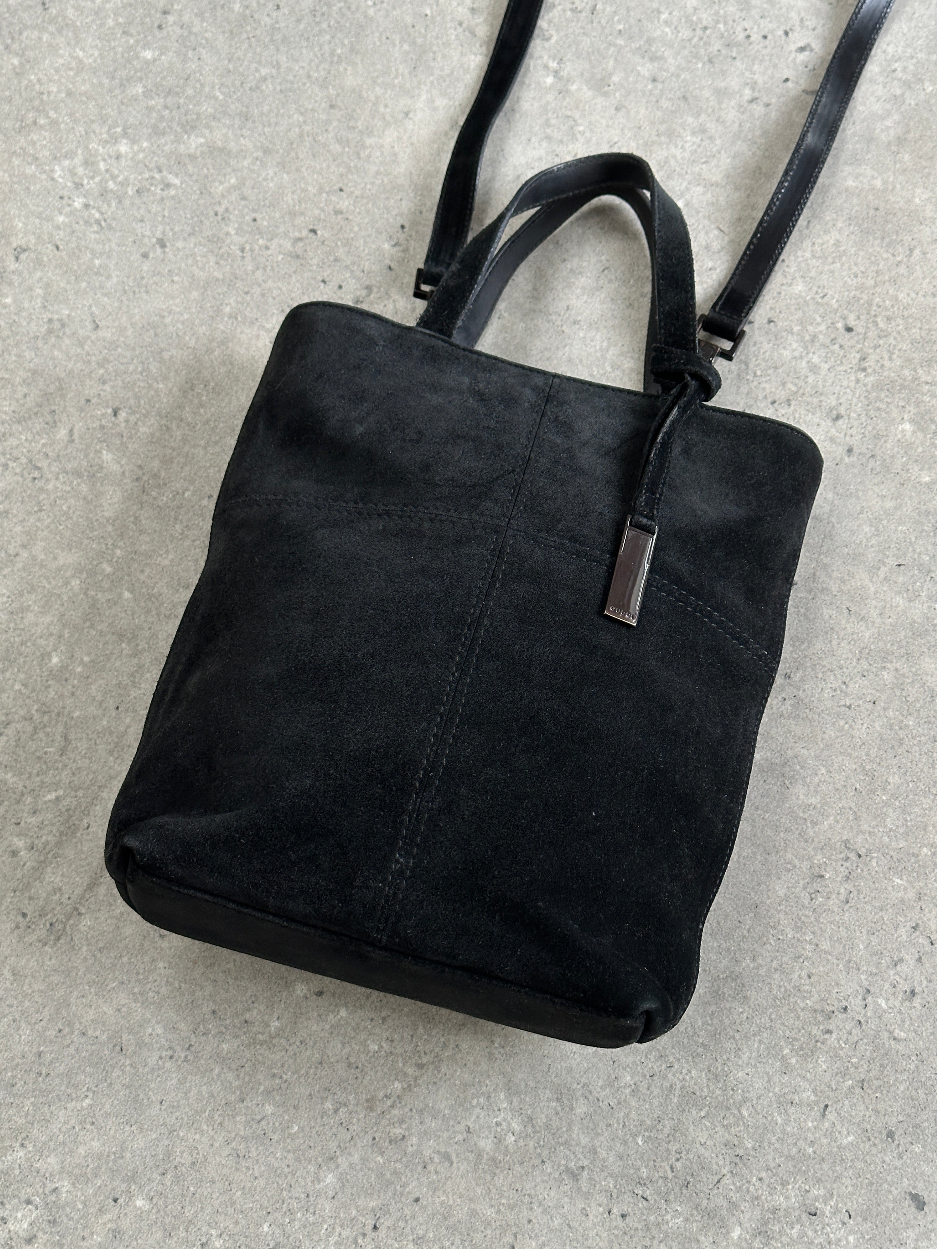 Gucci 2000s suede top handle crossbody bag with structured design and elegant strap, perfect for stylish everyday wear.