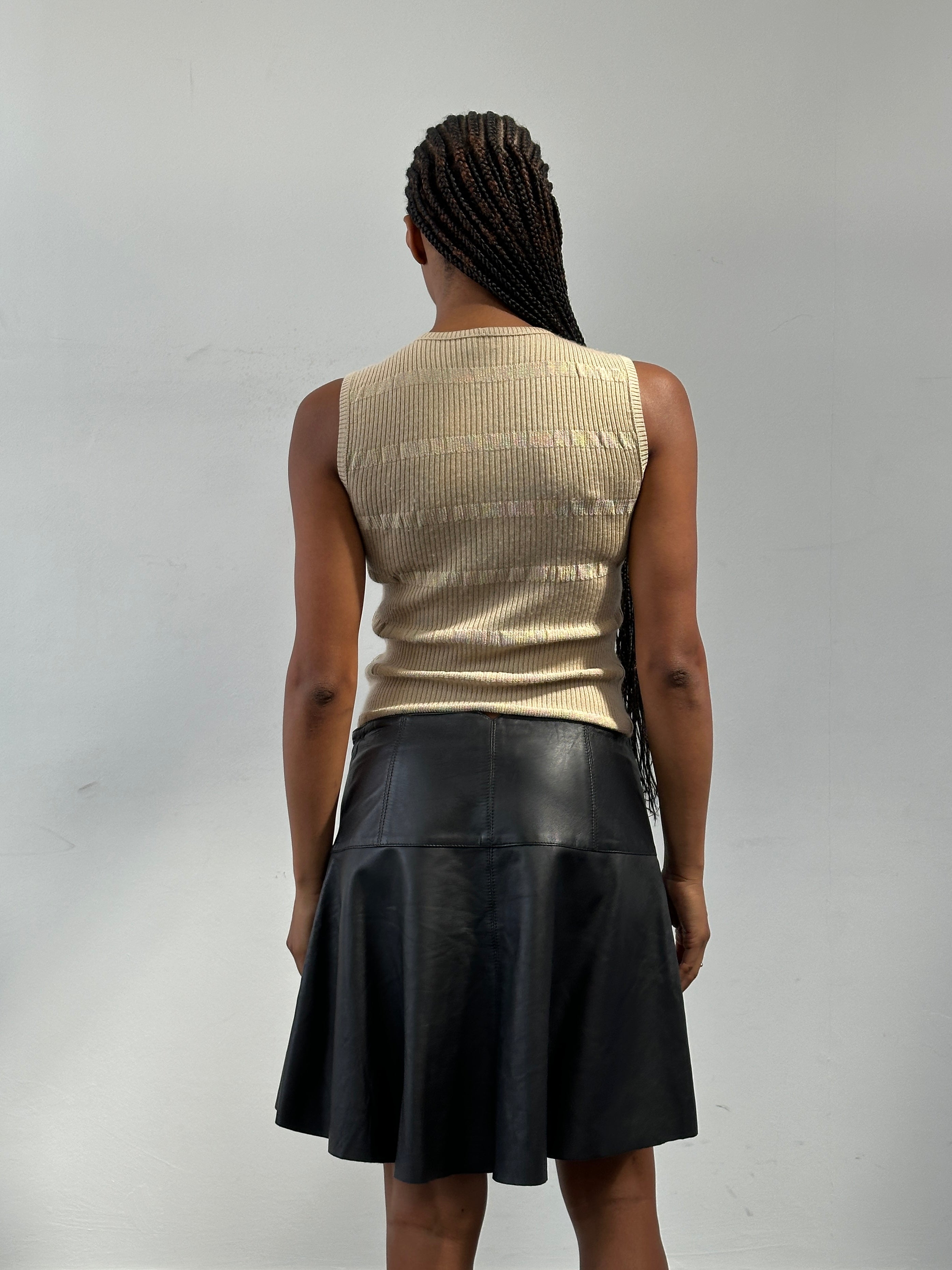 Pinko Italian leather A-line skirt in pink with a high waist, shown on a mannequin. W30 size, stylish and elegant design.
