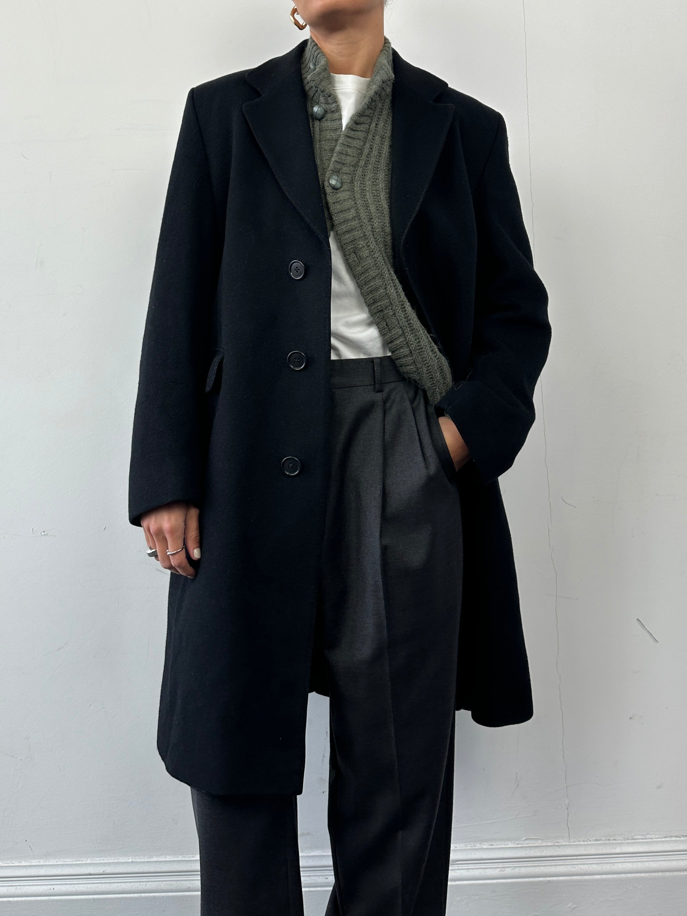Vintage pure cashmere single-breasted coat with concealed placket, in size L, featuring a classic tailored design.