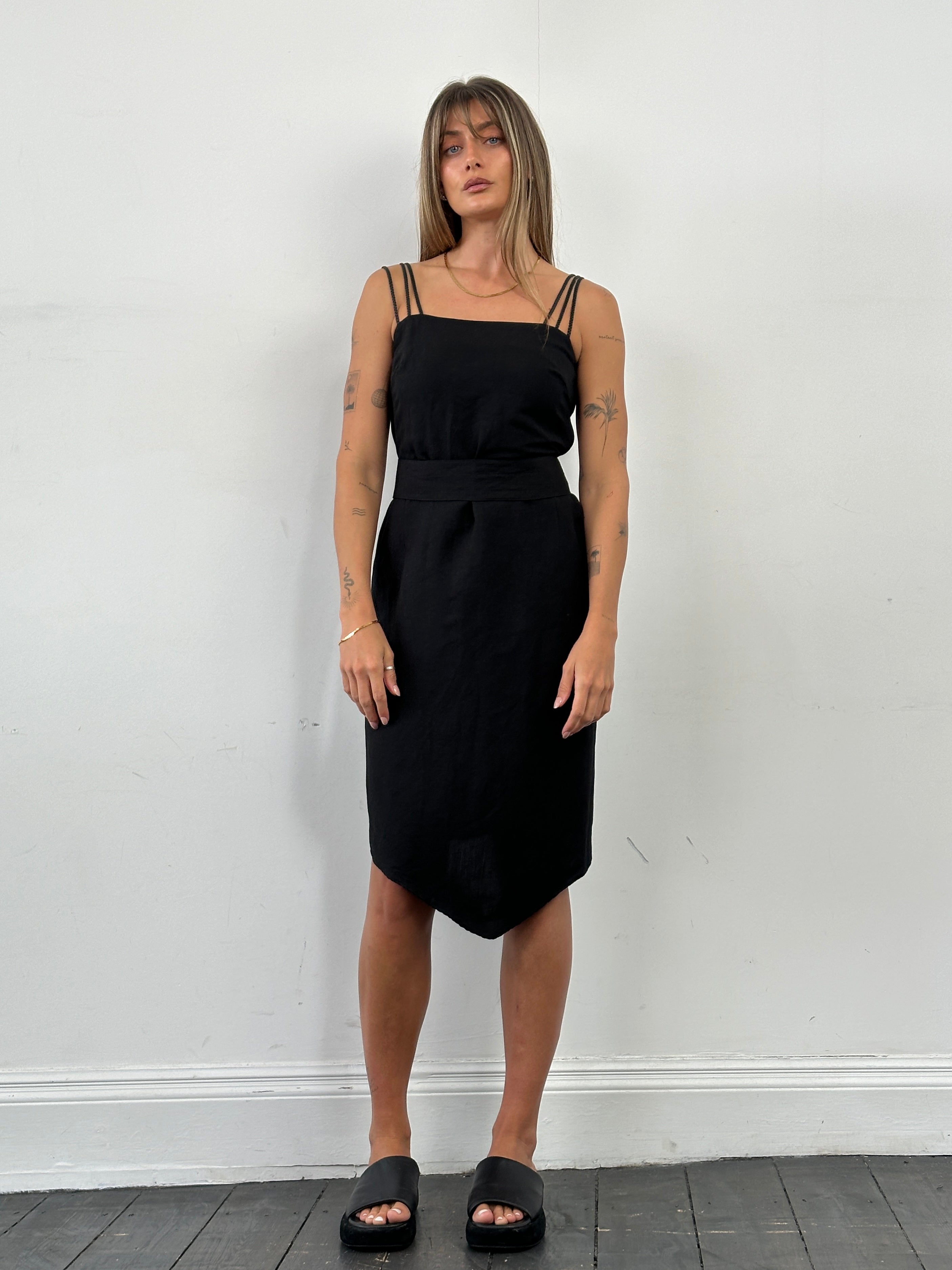 Marella asymmetric linen belted dress in M/L displayed on a hanger, showcasing its stylish design and neutral color.