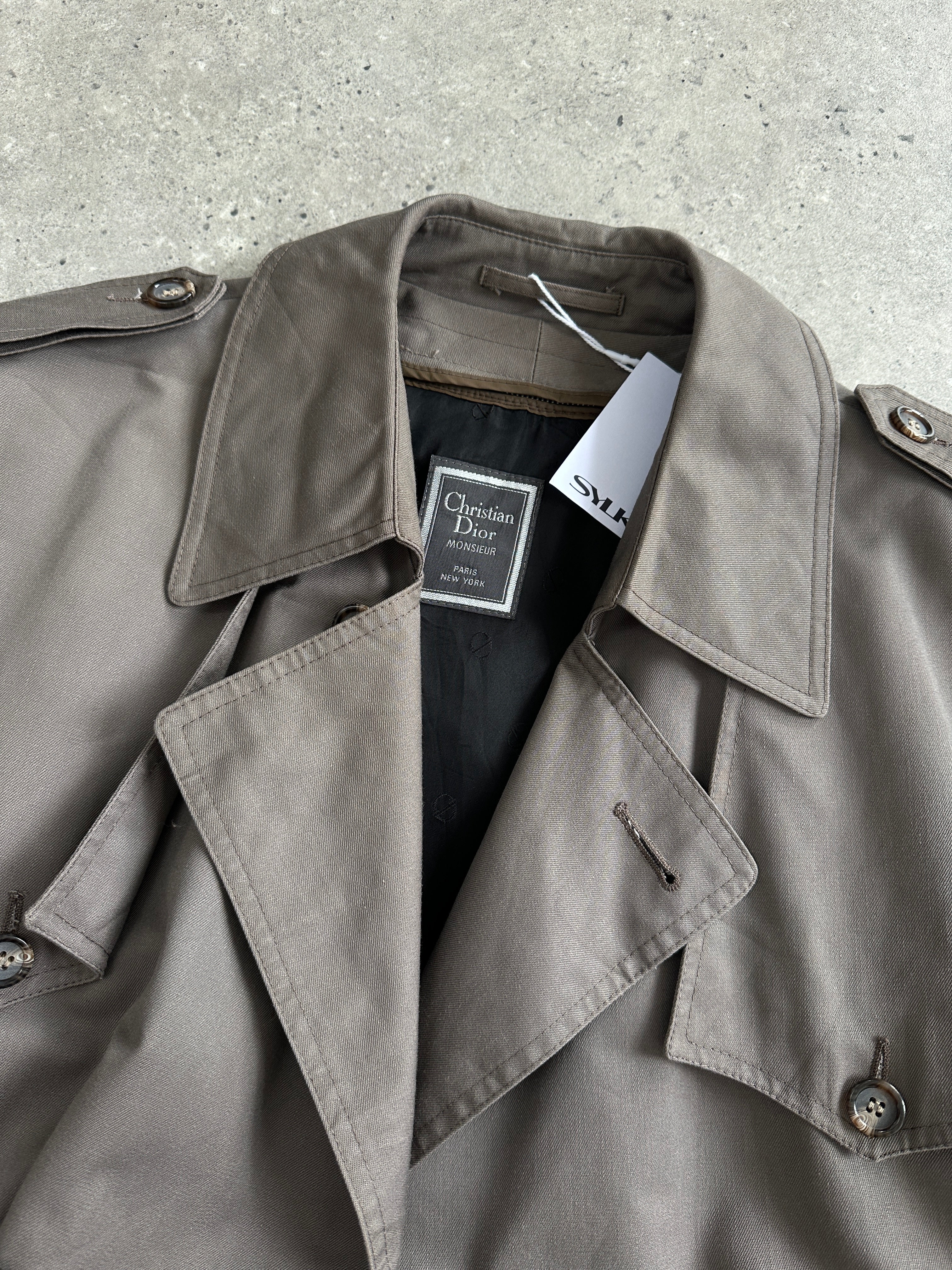 Christian Dior Monsieur double-breasted belted trench coat, tailored fit, classic beige color, stylish and elegant outerwear.