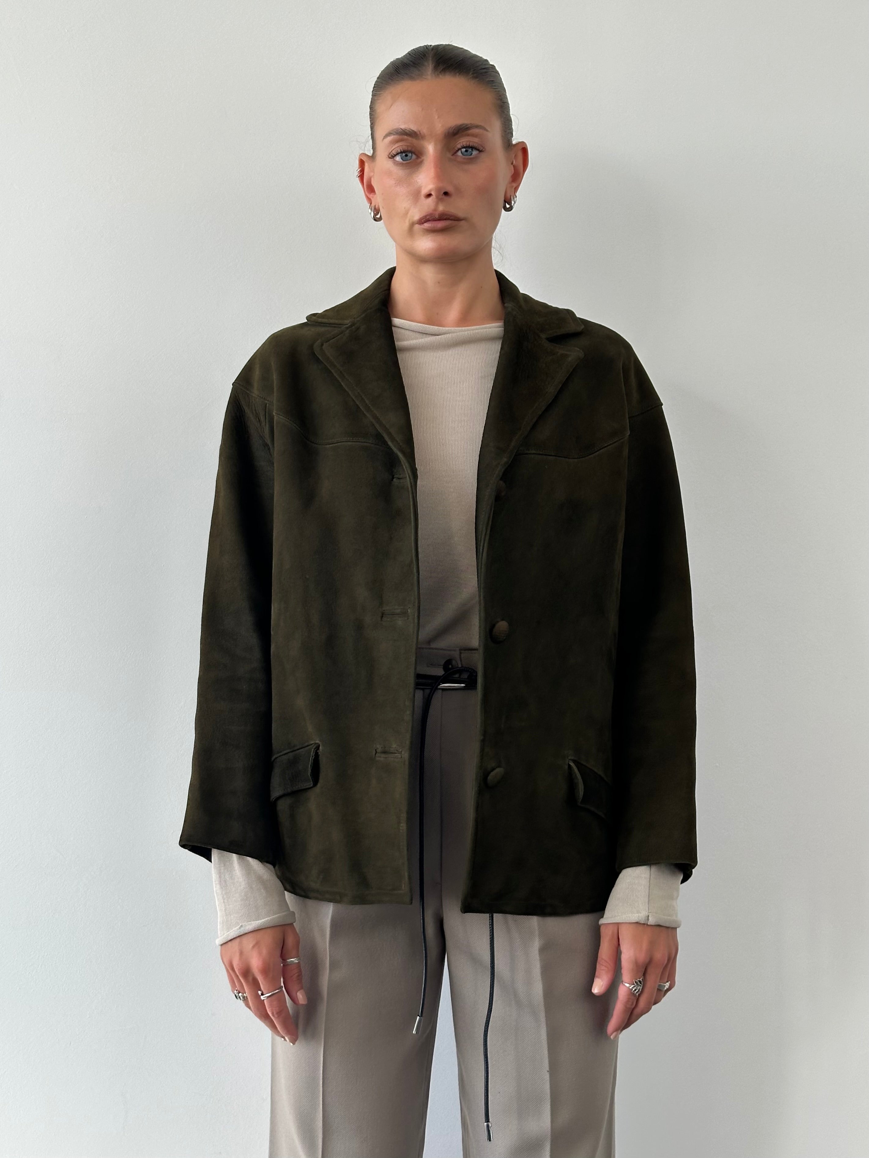 Vintage suede blazer jacket in size M, featuring classic tailored design and soft textured suede fabric.