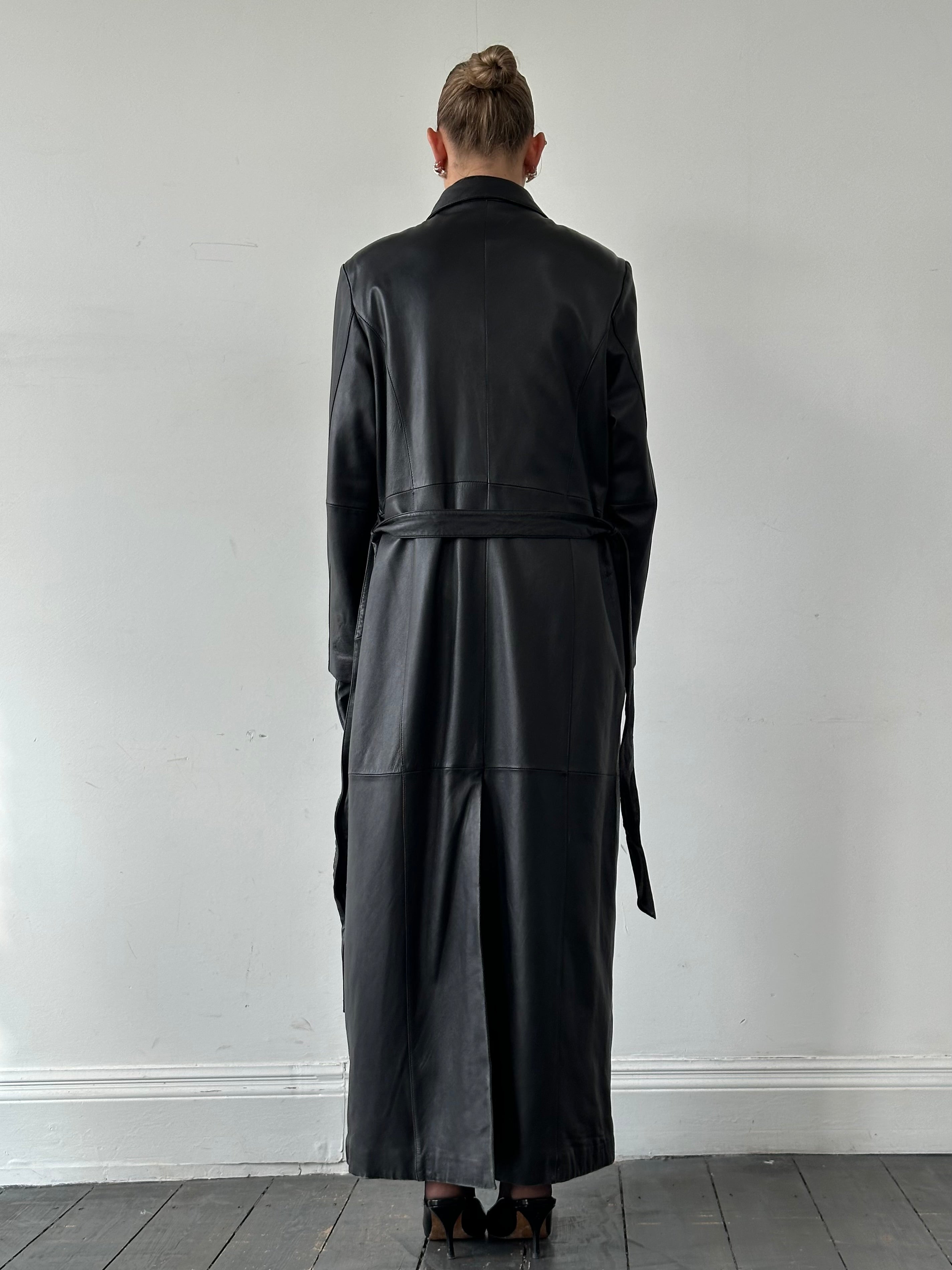 Vintage leather trench coat, floor-length belted design in XL size, featuring classic style and durable leather material.