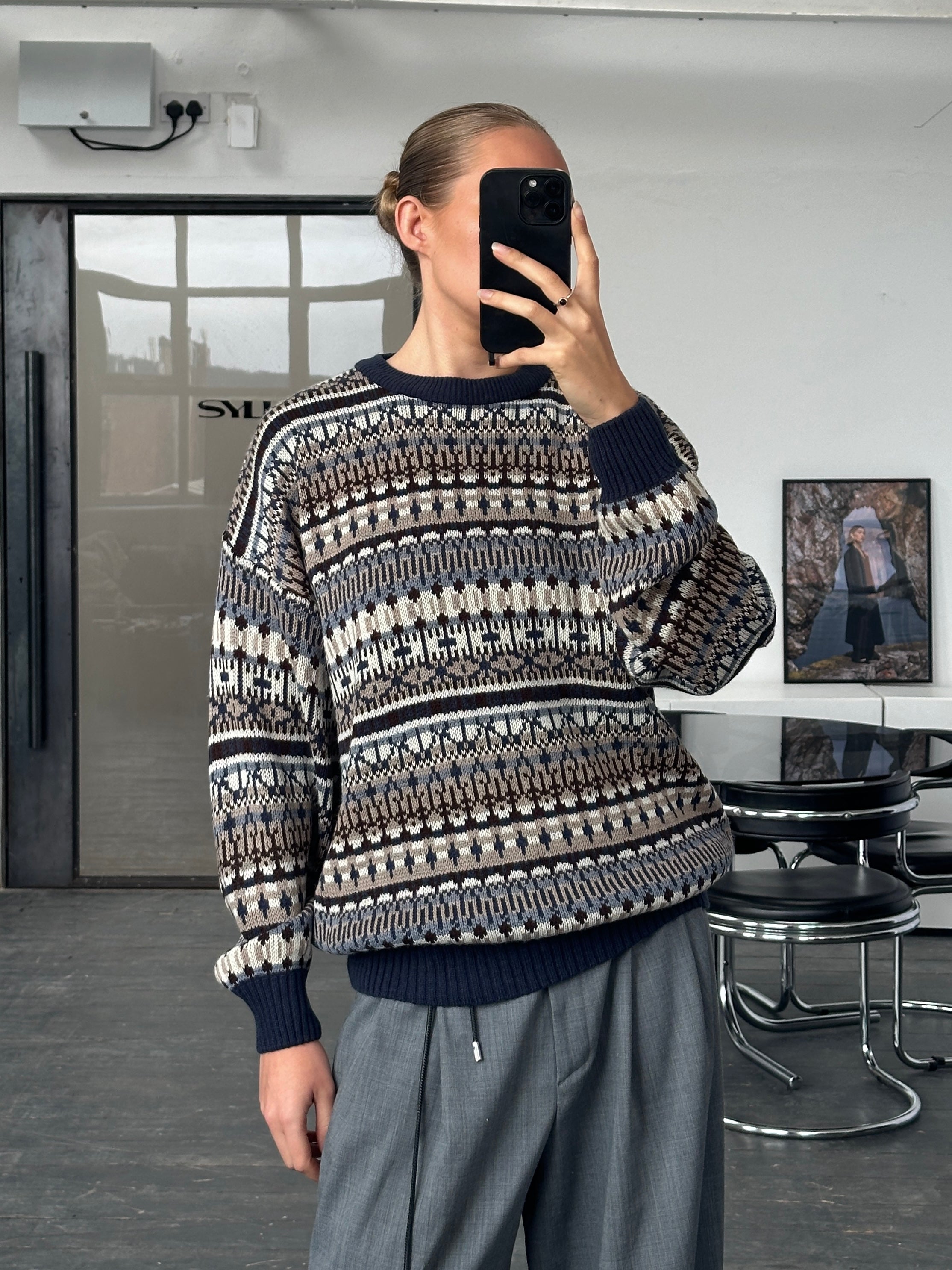 Vintage 1990s Fair Isle knitted jumper in size large/x-large, featuring classic multicolor geometric patterns.