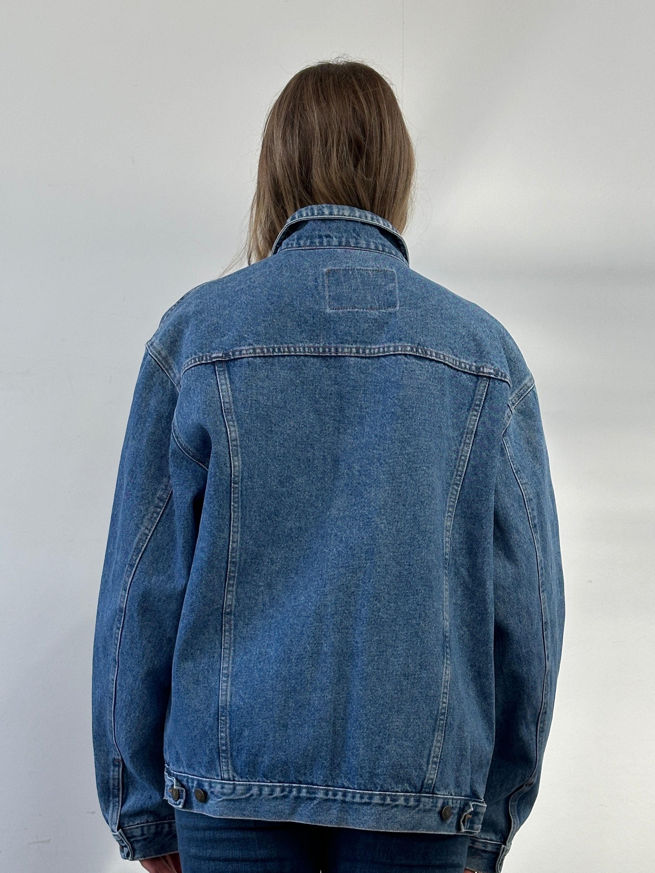 Vintage oversized pure cotton denim jacket in XL, casual style with classic denim details and button-front closure.