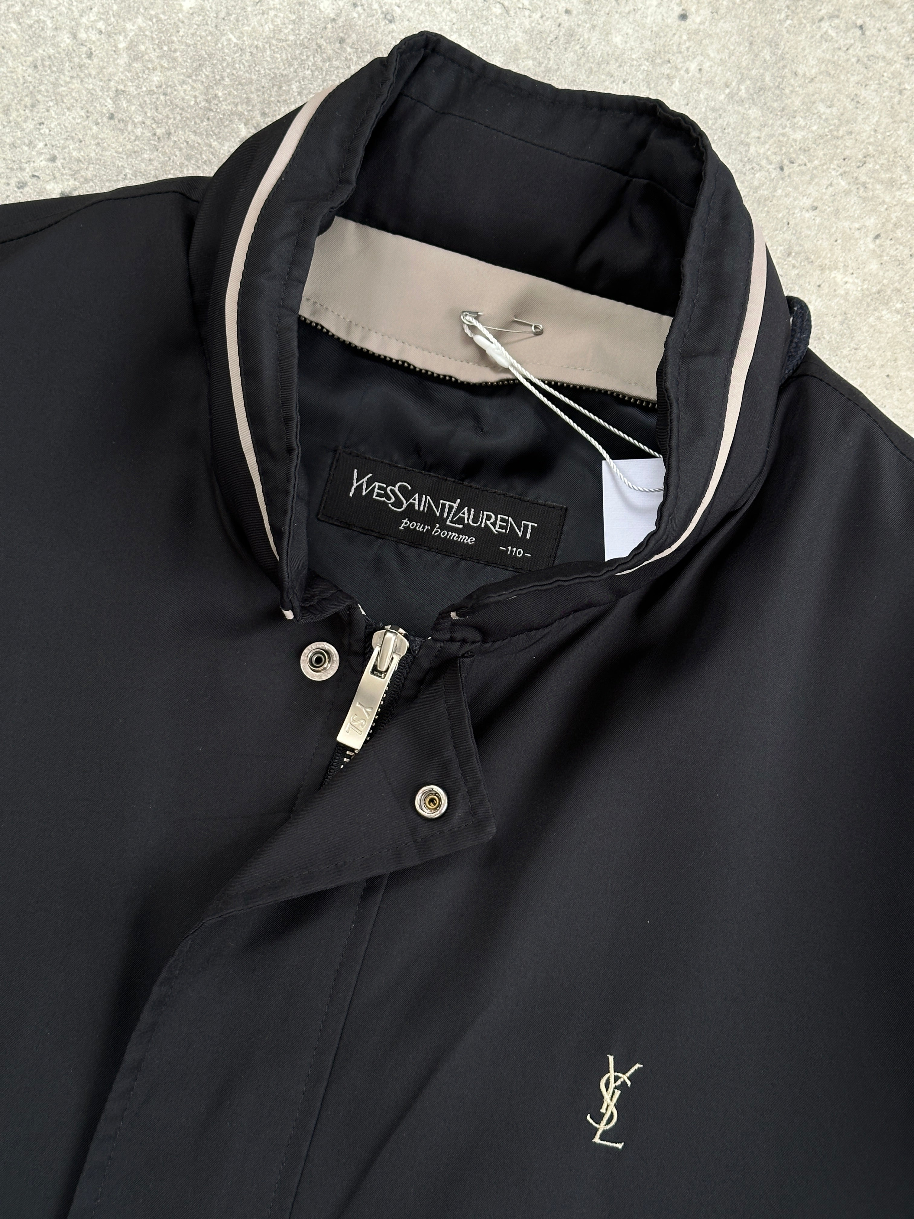 Yves Saint Laurent Pour Homme showerproof logo bomber jacket in XL/XXL, black with subtle branding and a sleek bomber style.