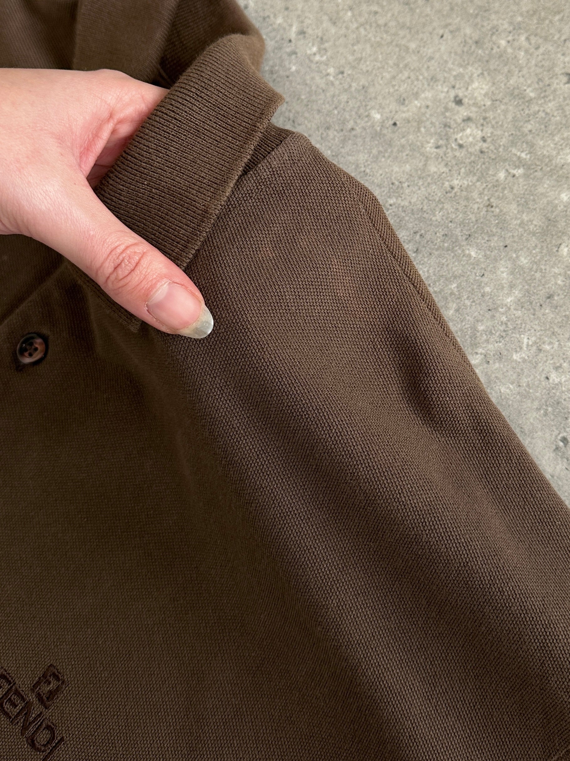 Fendi cotton logo polo jumper in size L/XL, featuring the iconic Fendi branding and classic polo style.