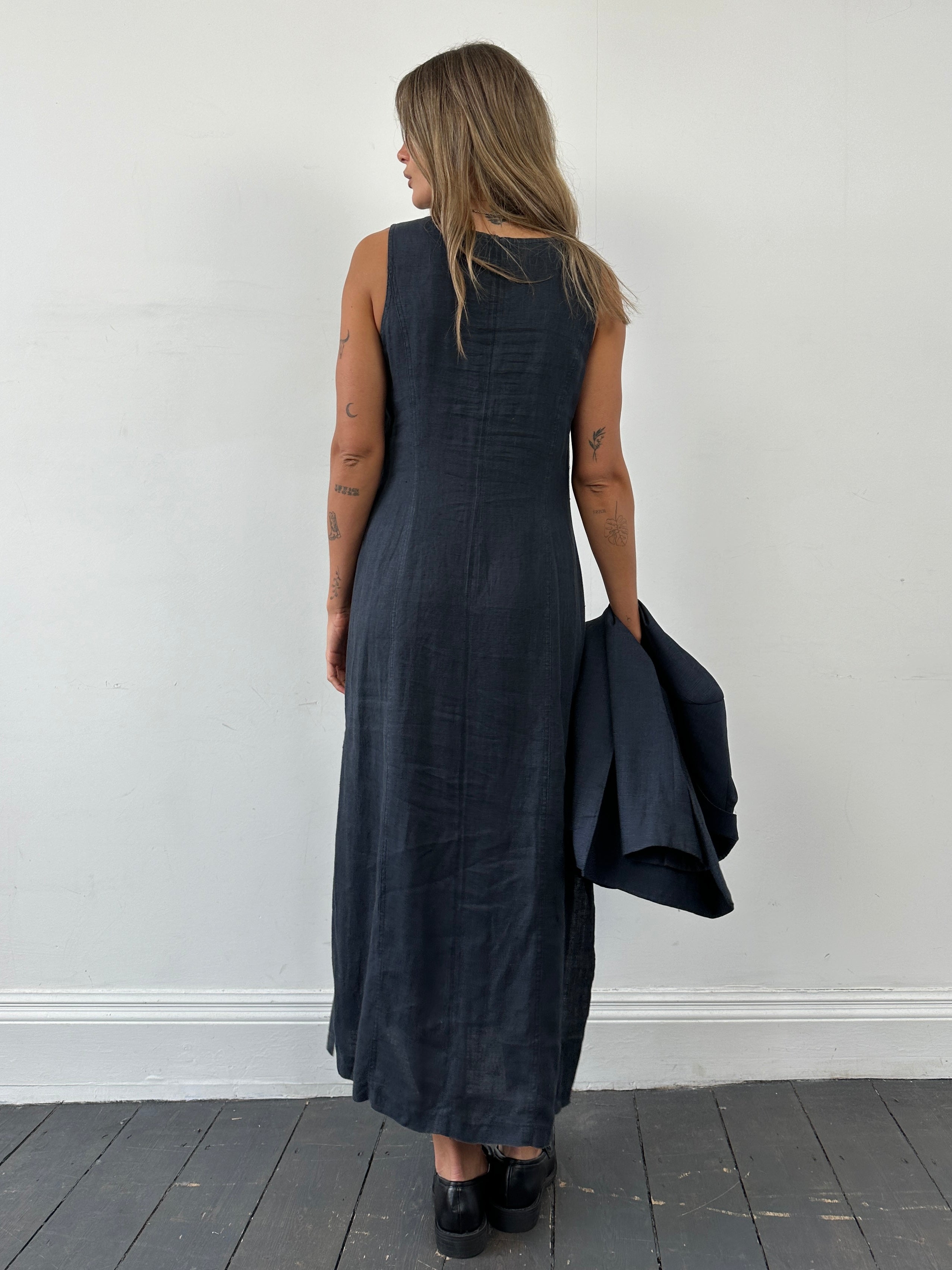 Vintage linen side split slip dress in size M, featuring a classic design with a relaxed fit and subtle side slit detail.
