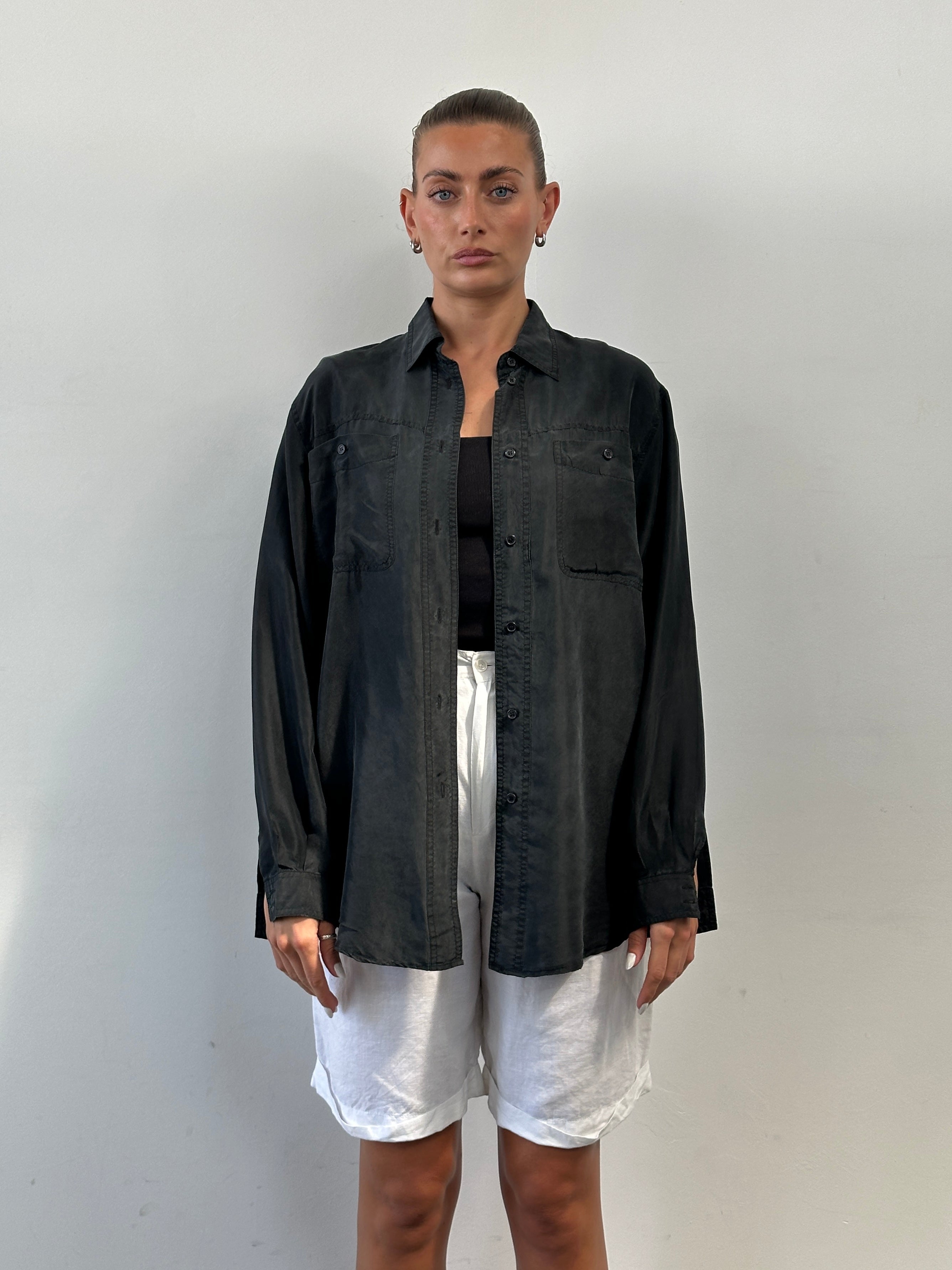 Vintage pure silk shirt in size L/XL, featuring a classic design with a smooth, shiny fabric and elegant collar.
