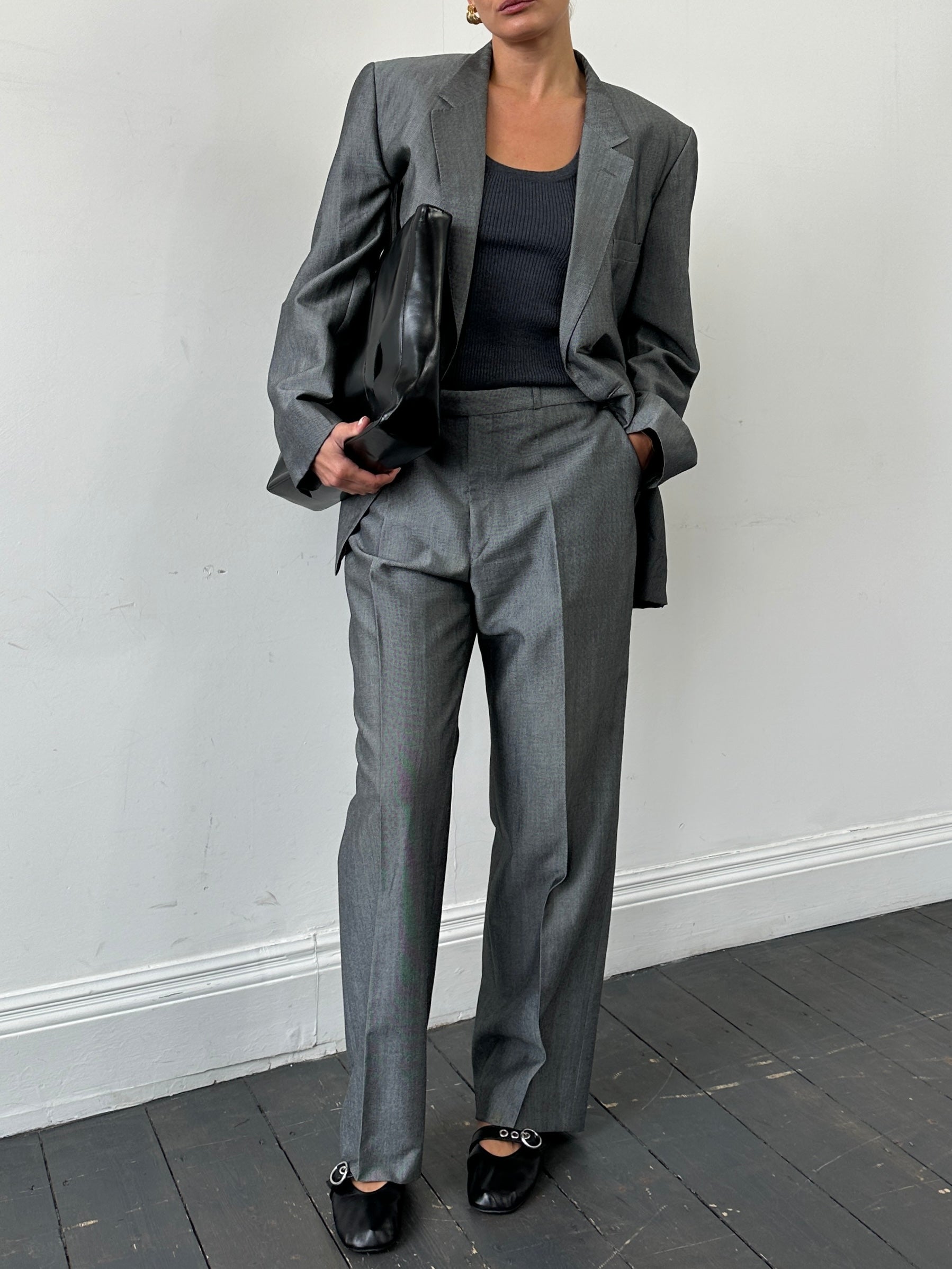 Christian Dior Monsieur wool single-breasted suit in size 44L/W36, tailored fit, with classic lapel and front button closure.