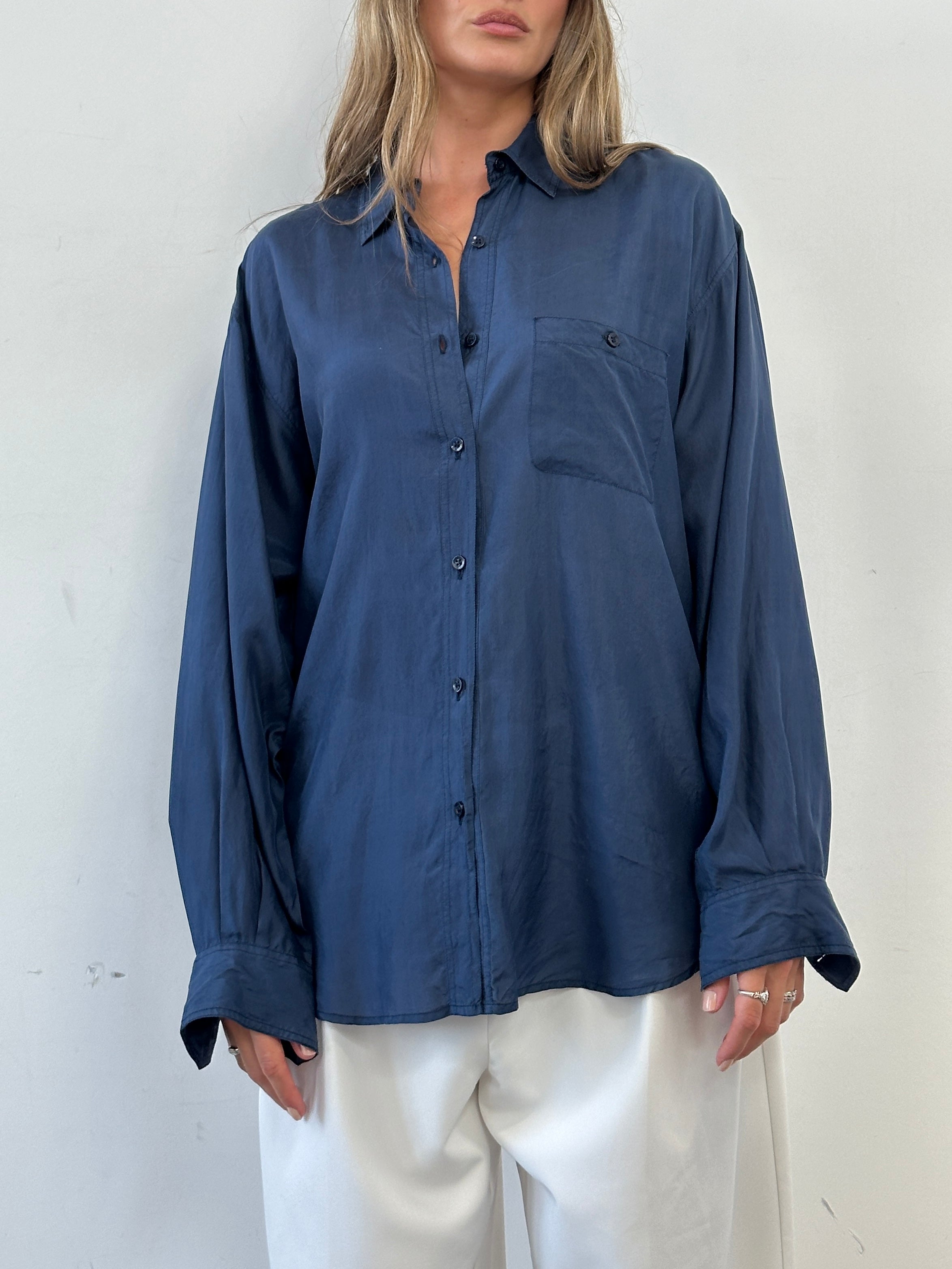 Vintage relaxed pure silk shirt in XL size, soft and smooth fabric, shown in a classic button-up style.