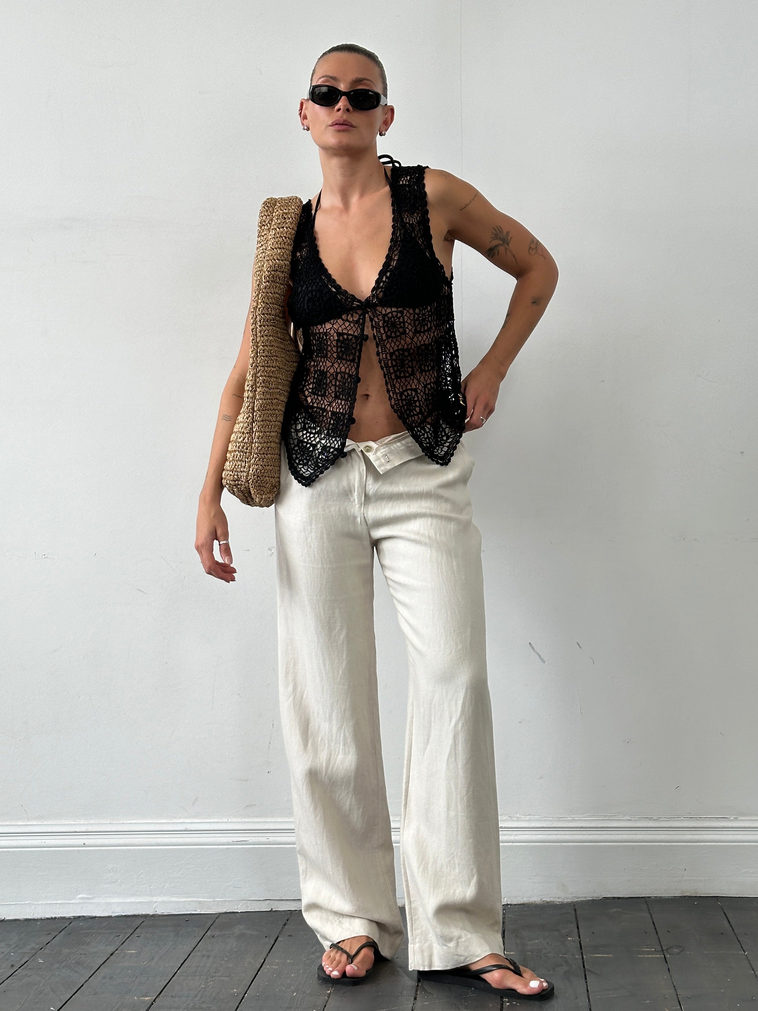 Vintage crochet waistcoat in size M, featuring intricate handmade detailing and a classic retro style.