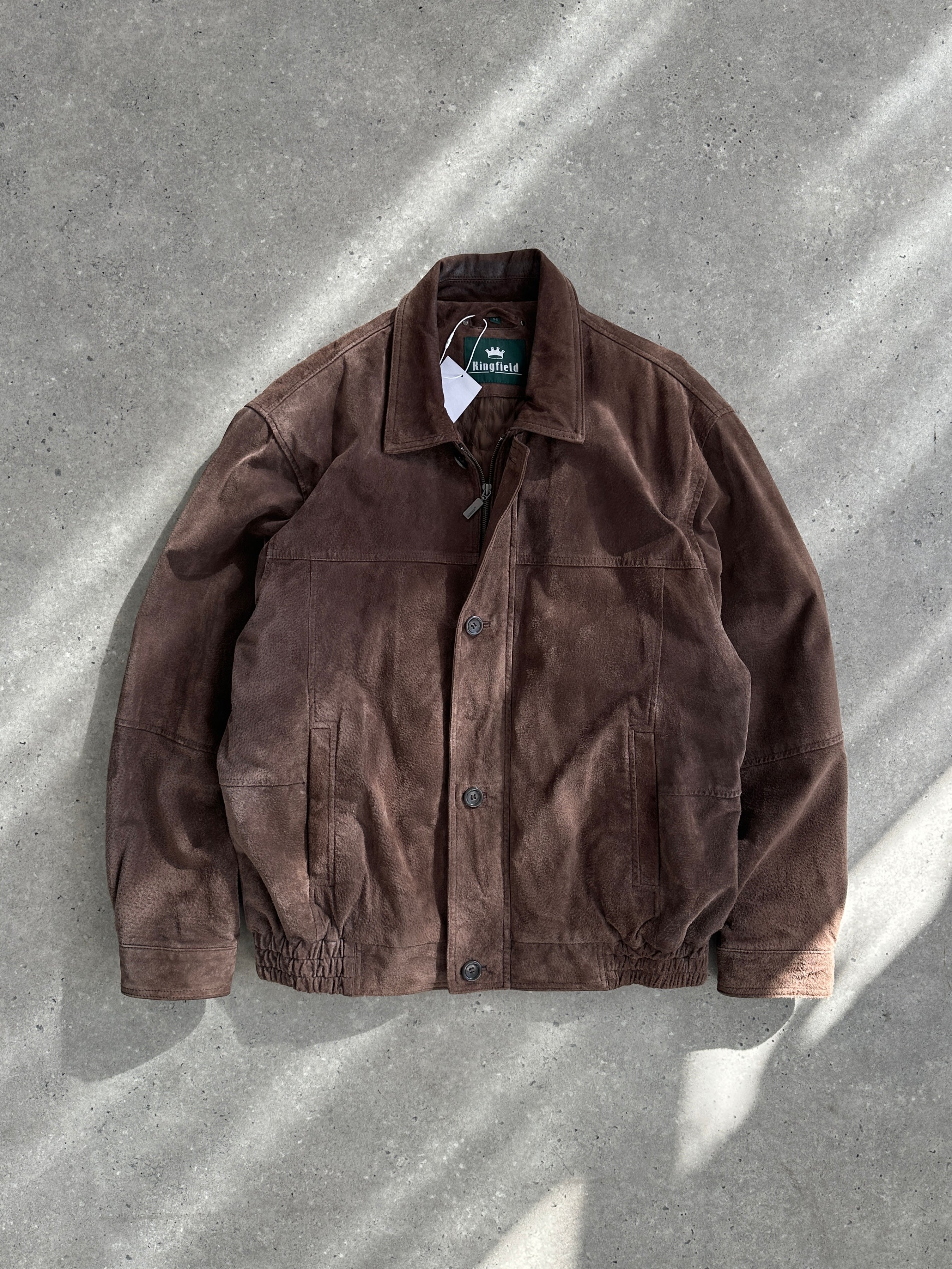 Vintage suede leather bomber jacket in size L, featuring classic design and rugged texture suitable for casual wear.